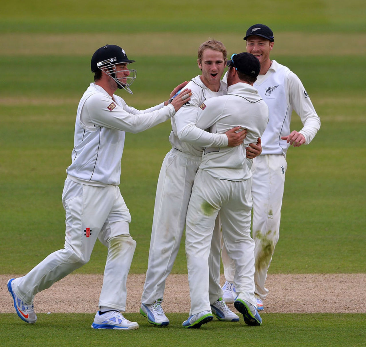 Kane Williamson is congratulated on removing Jonathan Trott, England v New Zealand, 1st Investec Test, Lord's, 3rd day, May 18, 2013