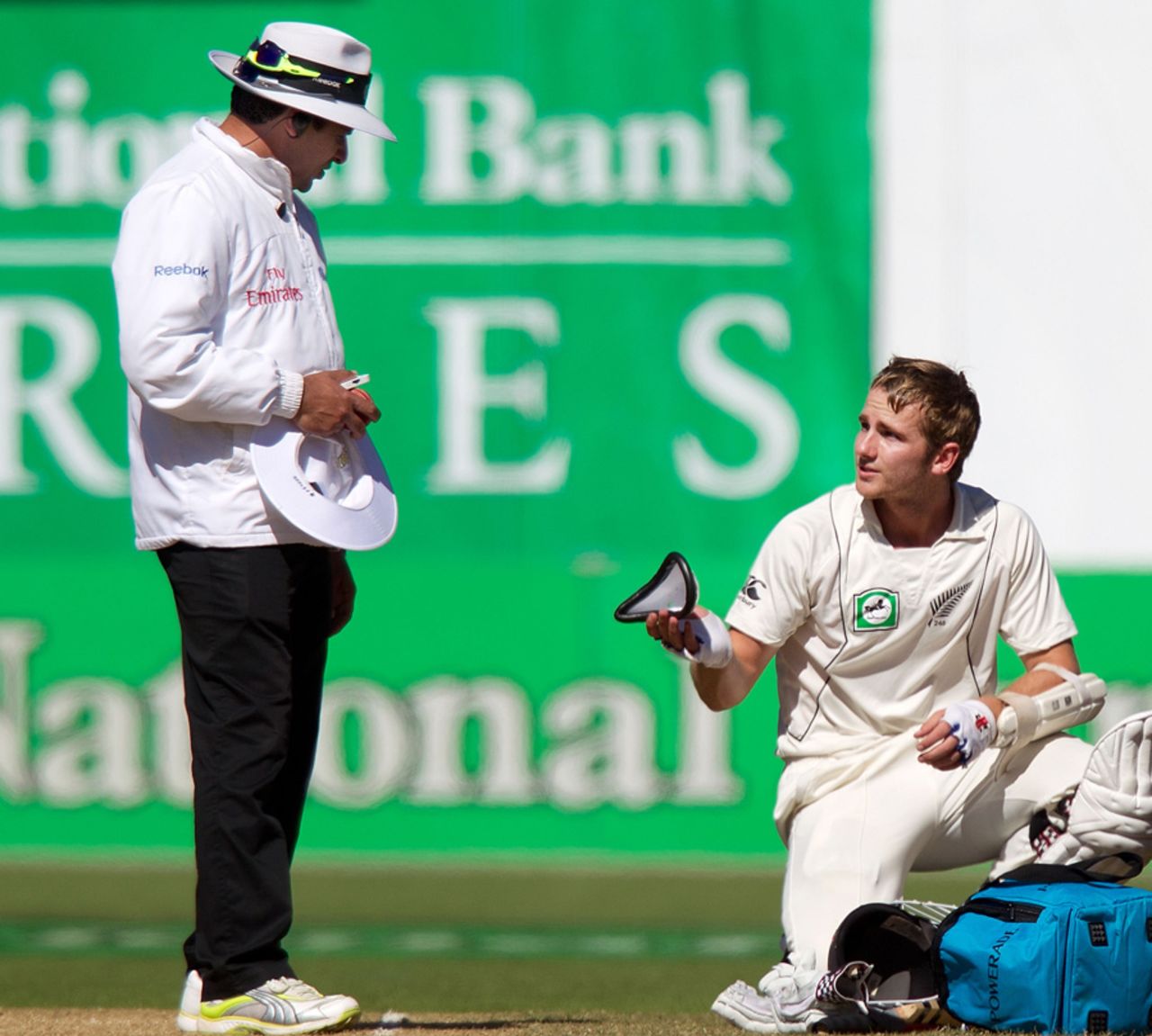 Kane Williamson shows umpire Aleem Dar his damaged box, New Zealand v South Africa, 3rd Test, Wellington, 5th day, March 27, 2012