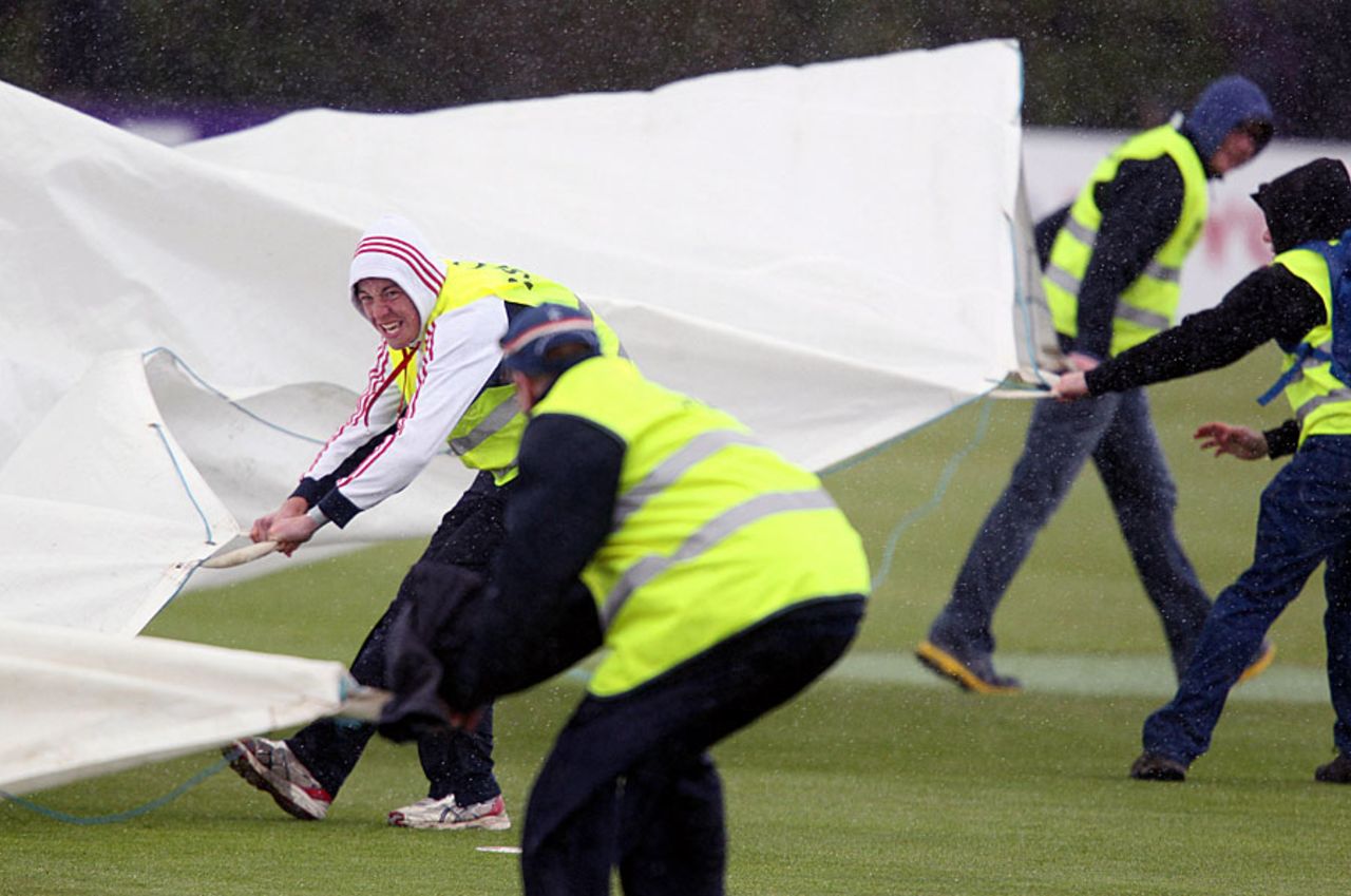 Ground staff try to get the pitch covered in time, Ireland v Pakistan, 1st ODI, Dublin, May 23, 2013