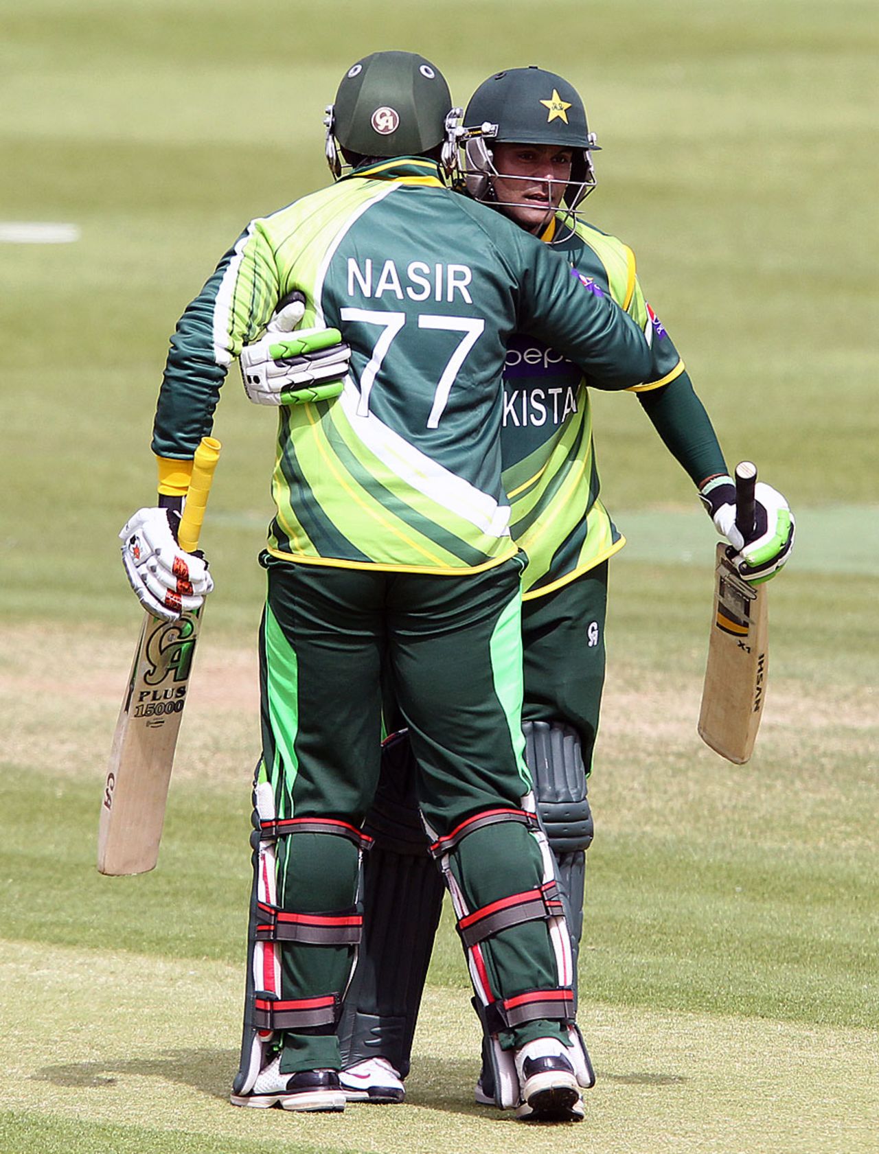 Mohammad Hafeez is congratulated by Nasir Jamshed on his century, Ireland v Pakistan, 1st ODI, Dublin, May 23, 2013