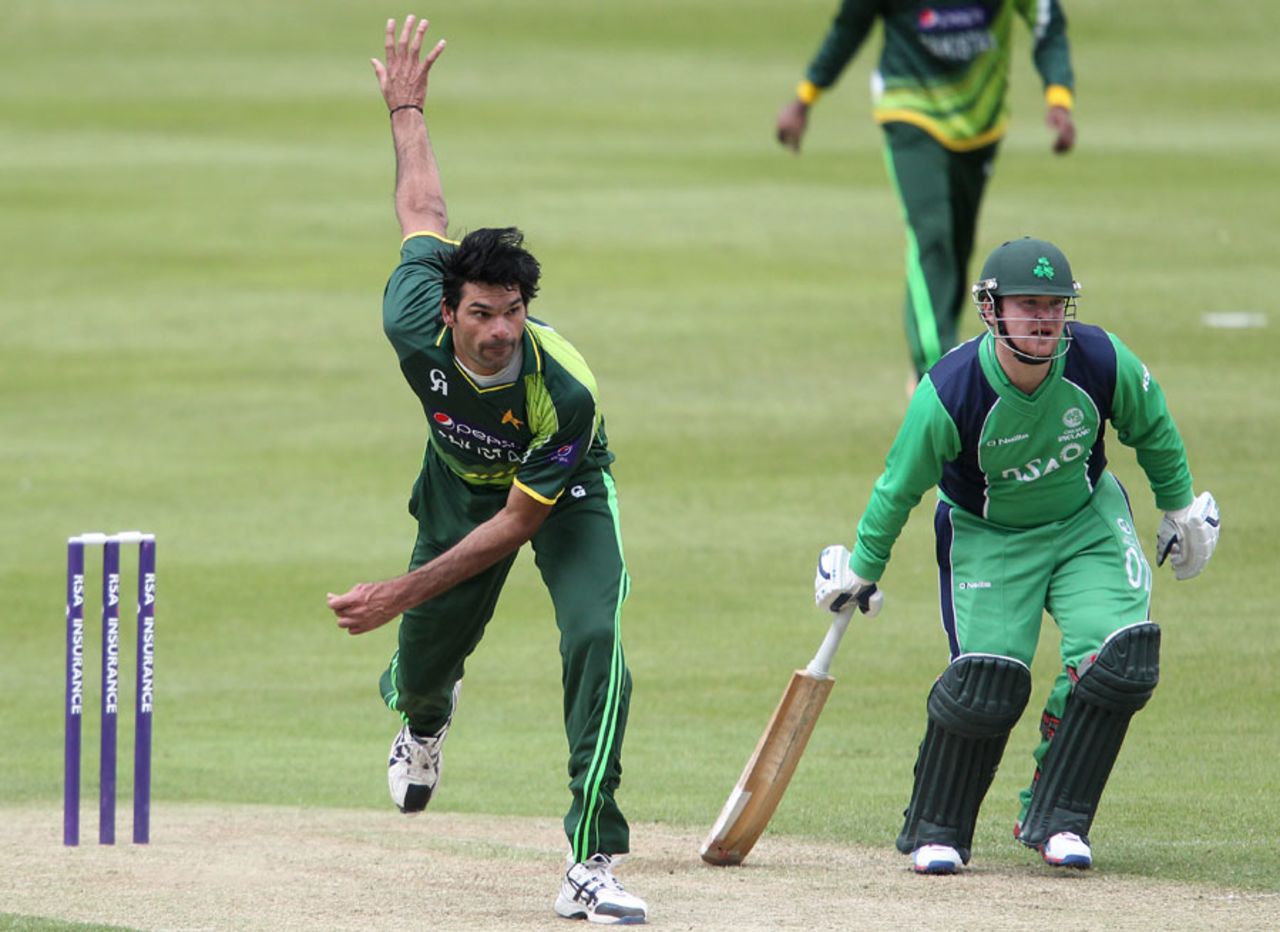 Mohammad Irfan bowls a delivery while Paul Stirling looks on, Ireland v Pakistan, 1st ODI, Dublin, May 23, 2013
