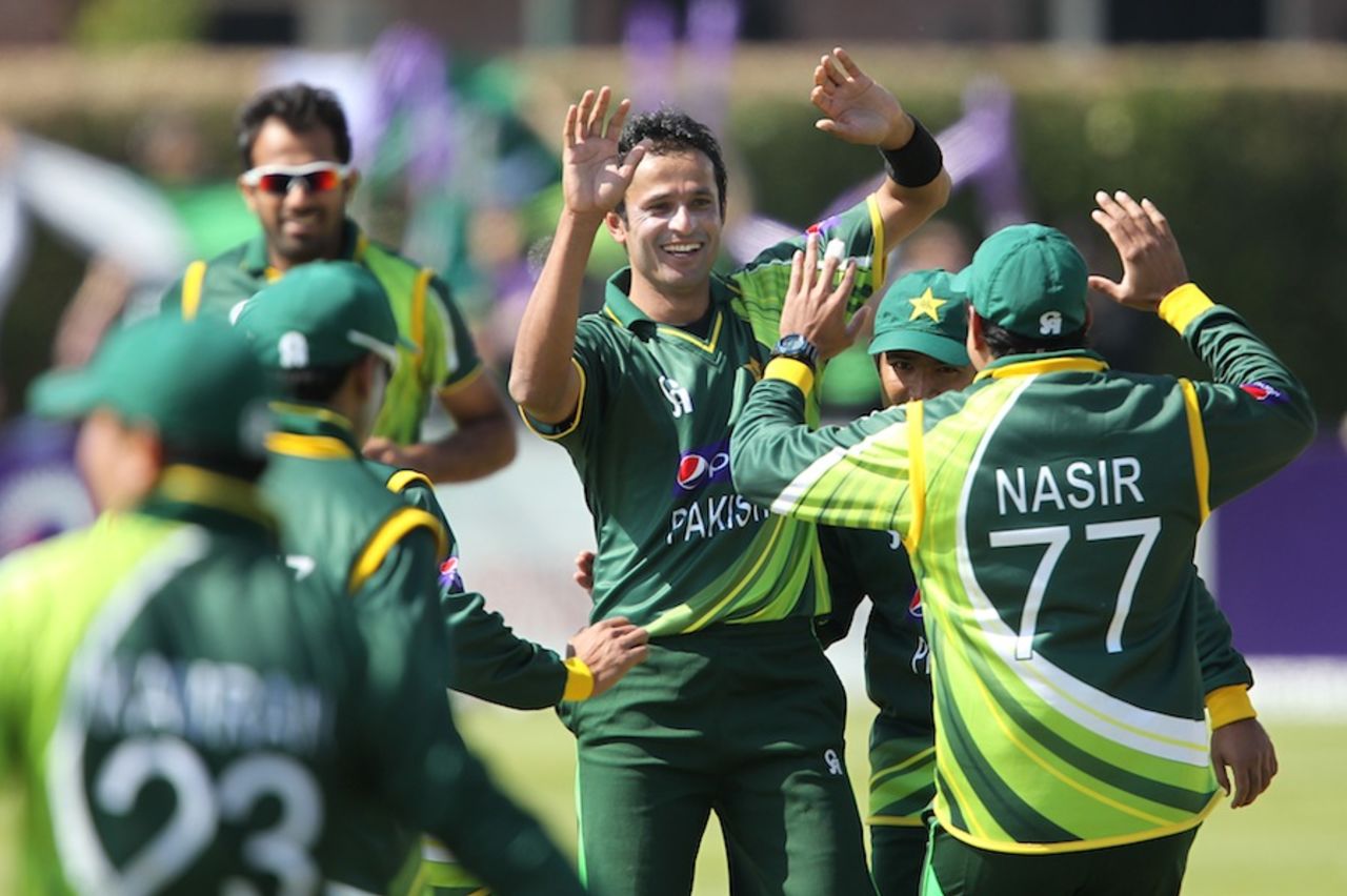Asad Ali celebrates his first international wicket with team mates, Ireland v Pakistan, 2nd ODI, Dublin, May 26, 2013