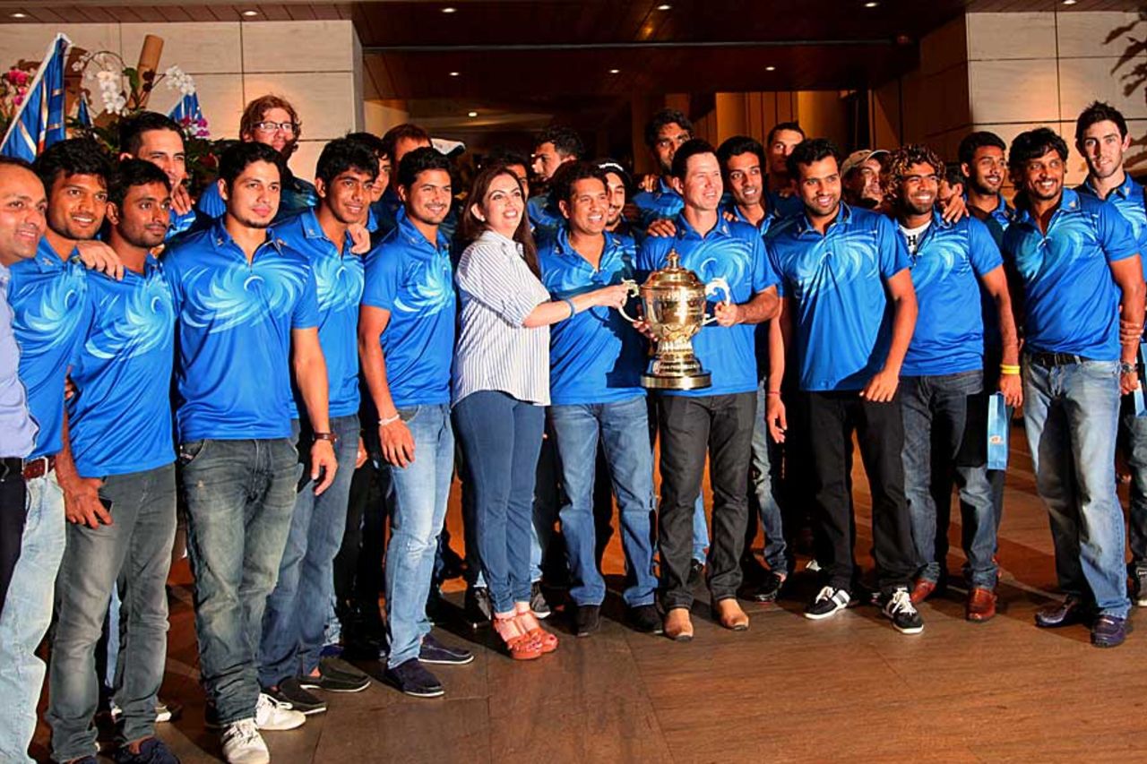 Nita Ambani, owner of Mumbai Indians, with the victorious team, Mumbai, May 28, 2013