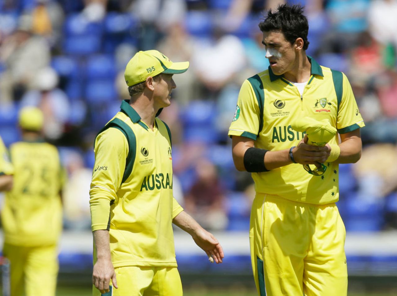 Mitchell Starc discusses tactics with George Bailey, Australia v West Indies, Champions Trophy 2013 warm-up match, Cardiff, June 1