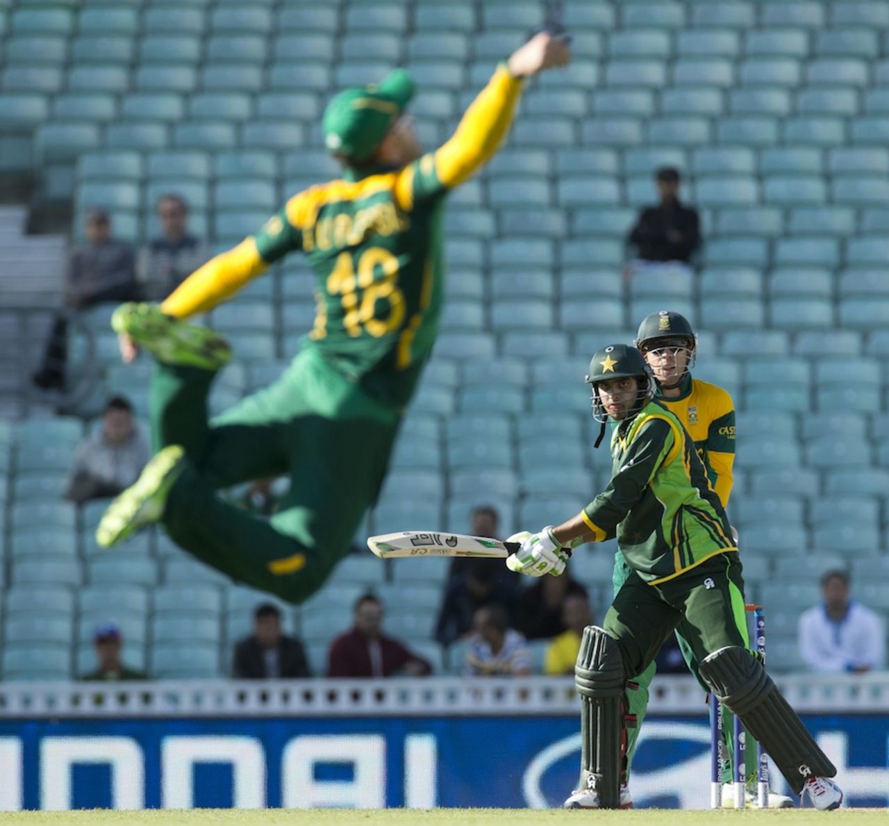 Faf du Plessis leaps to stop a shot from Umar Amin, Pakistan v South Africa, Champions Trophy warm-up, The Oval, June 3, 2013