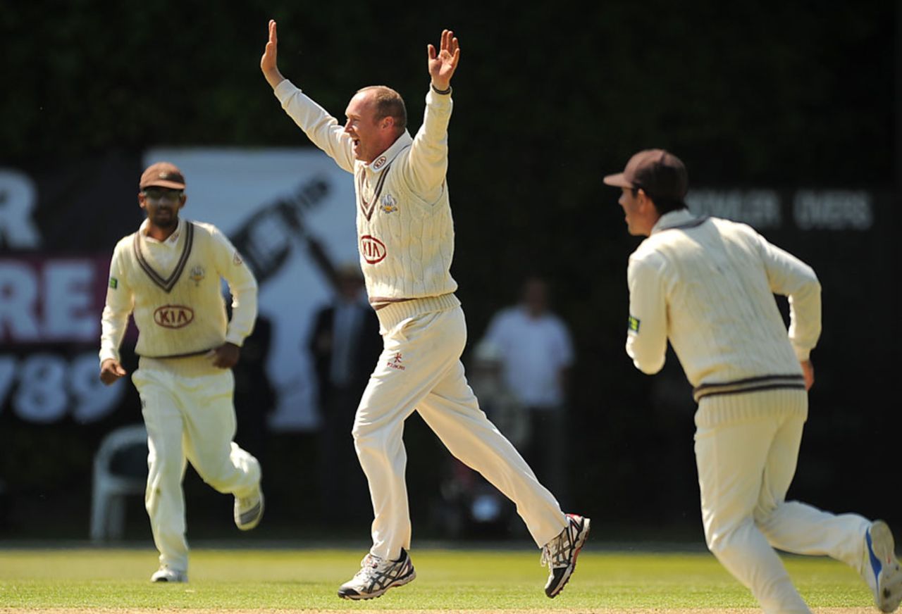 Gary Keedy celebrates the wicket of Ian Westwood, Surrey v Warwickshire, County Championship, Division One, Guildford, 1st day, June 5, 2013