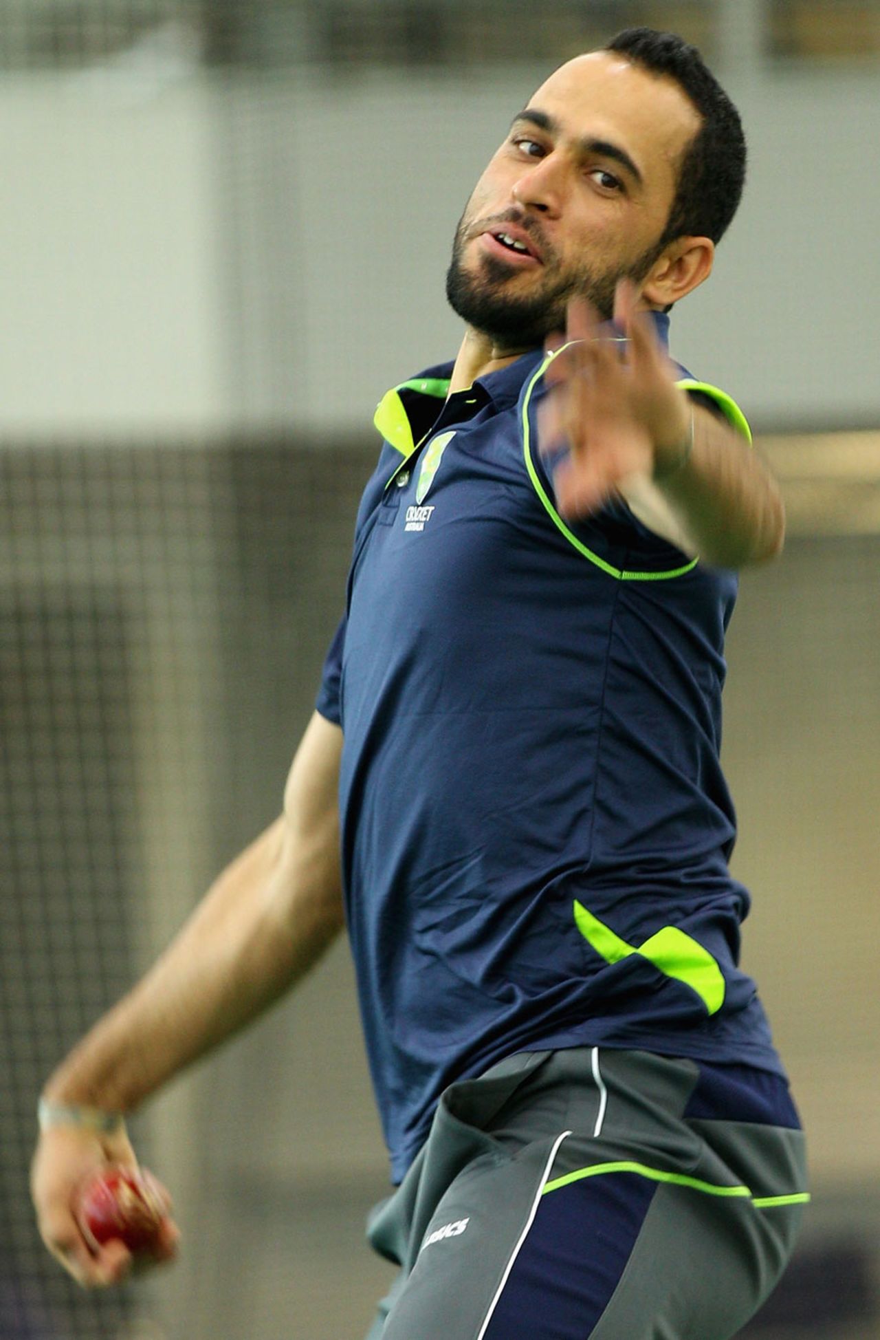 Fawad Ahmed bowls during a media session in Melbourne, June 6, 2013