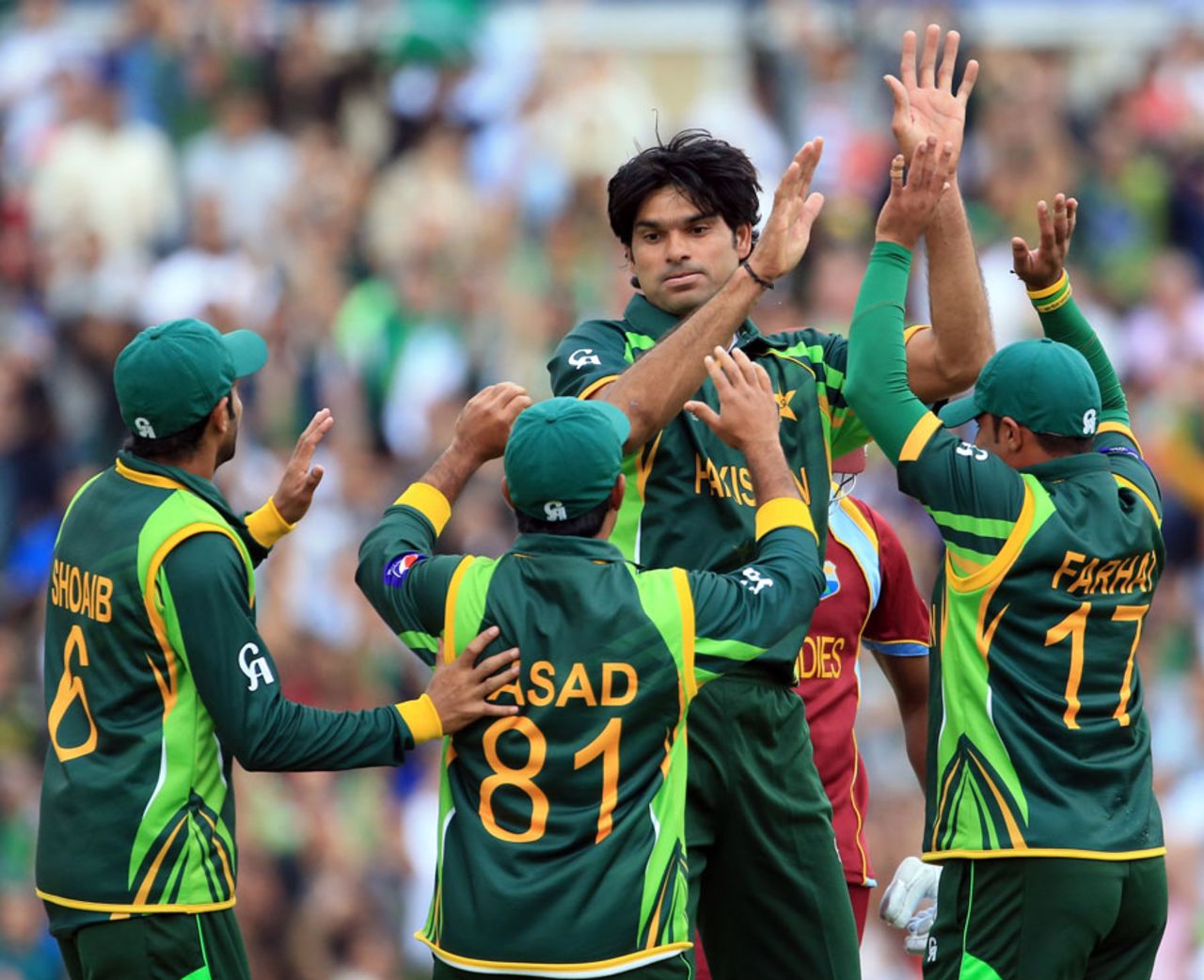 Mohammad Irfan celebrates a wicket with his team mates, West Indies v Pakistan, Champions Trophy, Group B, The Oval, June 7, 2013