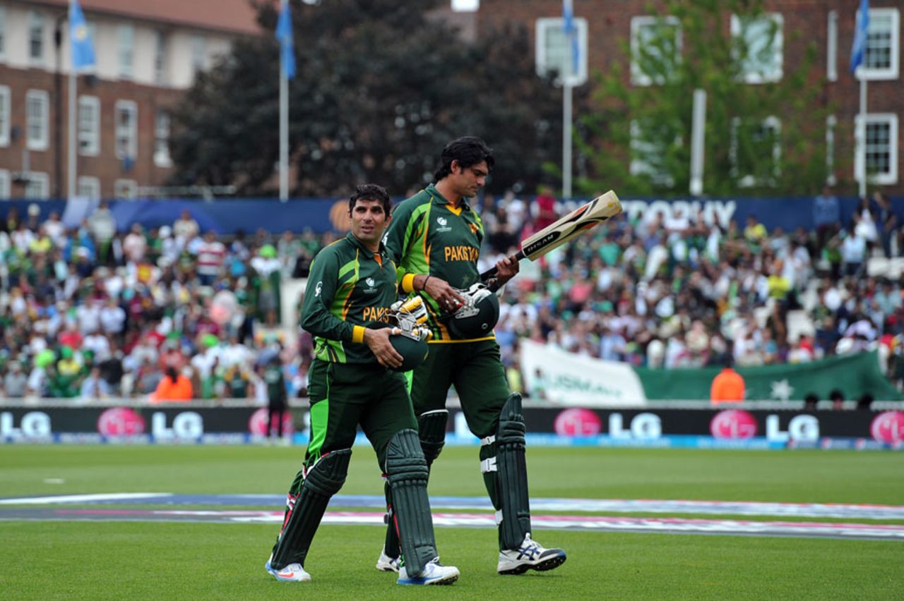 Misbah ul-Haq and Mohammad Irfan walk back to the pavilion, West Indies v Pakistan, Champions Trophy, Group B, The Oval, June 7, 2013