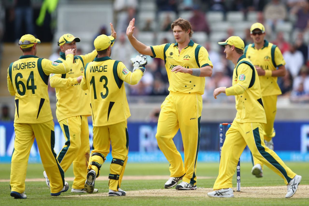 Shane Watson celebrates with his team-mates after dismissing Alastair Cook , England v Australia, Champions Trophy, Group A, Edgbaston, June 8, 2013