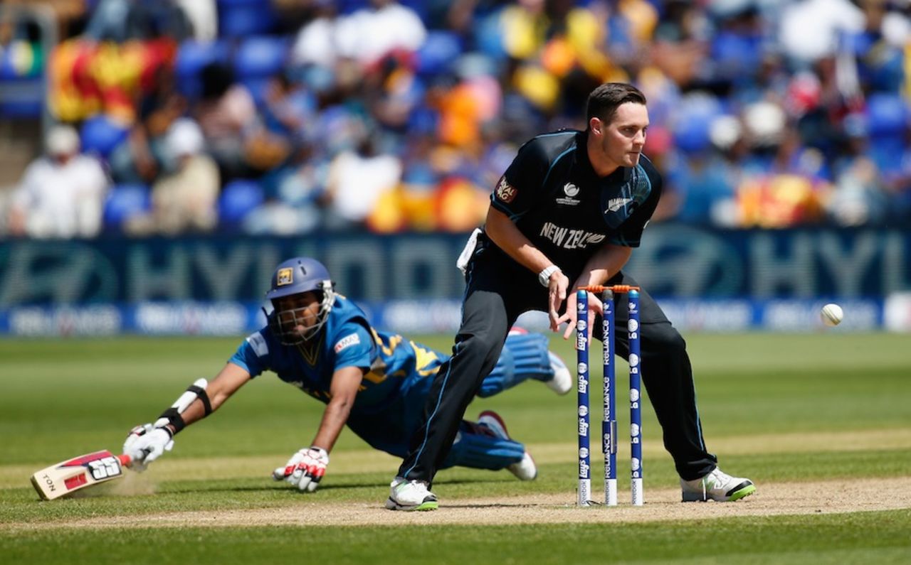 Lahiru Thirimanne dives to makes his ground before Mitchell McClenaghan can run him out, New Zealand v Sri Lanka, Champions Trophy, Group A, Cardiff, June 9, 2013