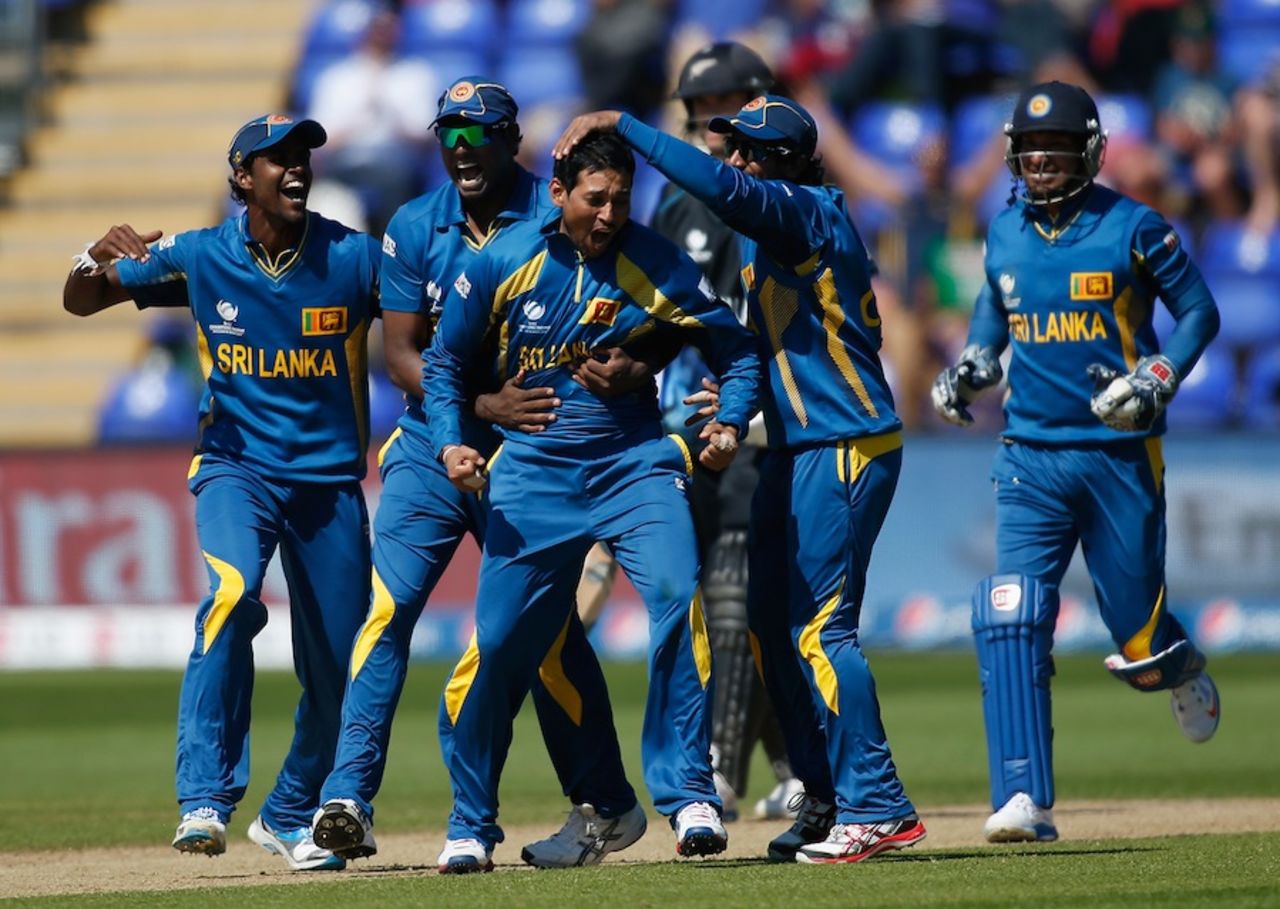 Tillakaratne Dilshan celebrates the wicket of James Franklin with team-mates, New Zealand v Sri Lanka, Champions Trophy, Group A, Cardiff, June 9, 2013