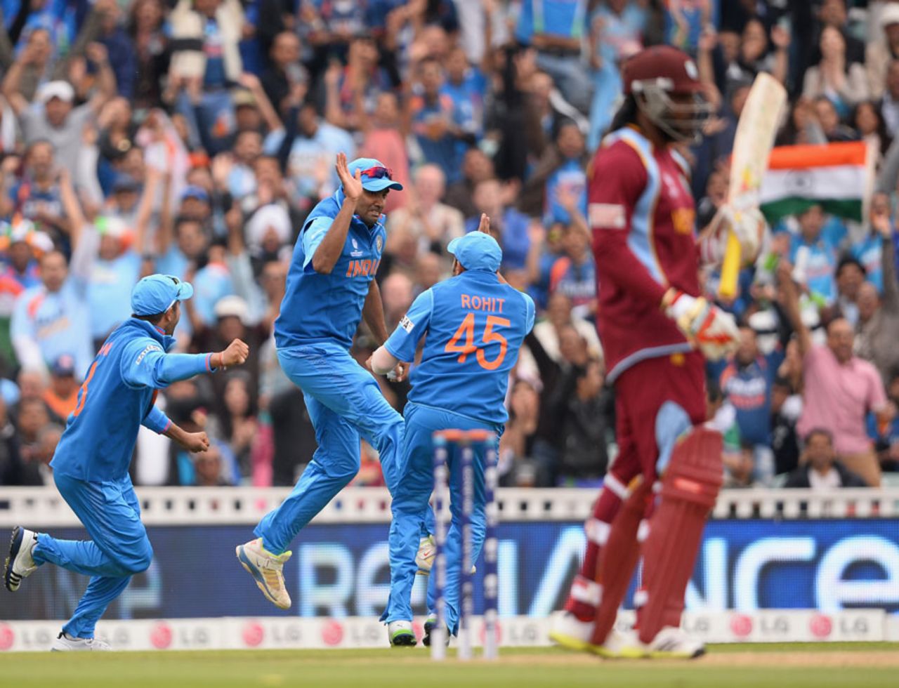 R Ashwin high-fives Rohit Sharma after completing a catch off Chris Gayle,  India v West Indies, Champions Trophy, Group B, The Oval, June 11, 2013