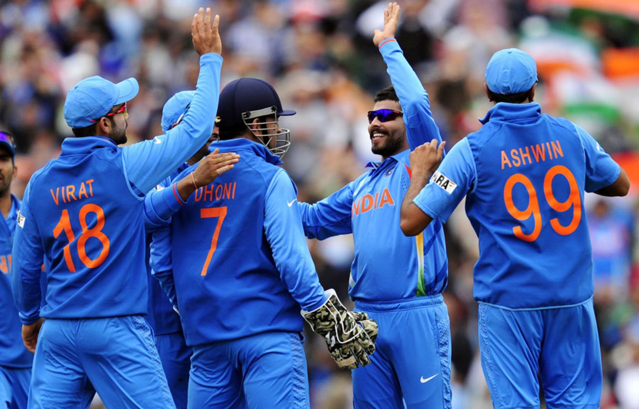 Ravindra Jadeja celebrates with team-mates after picking up a wicket, India v West Indies, Champions Trophy, Group B, The Oval, June 11, 2013