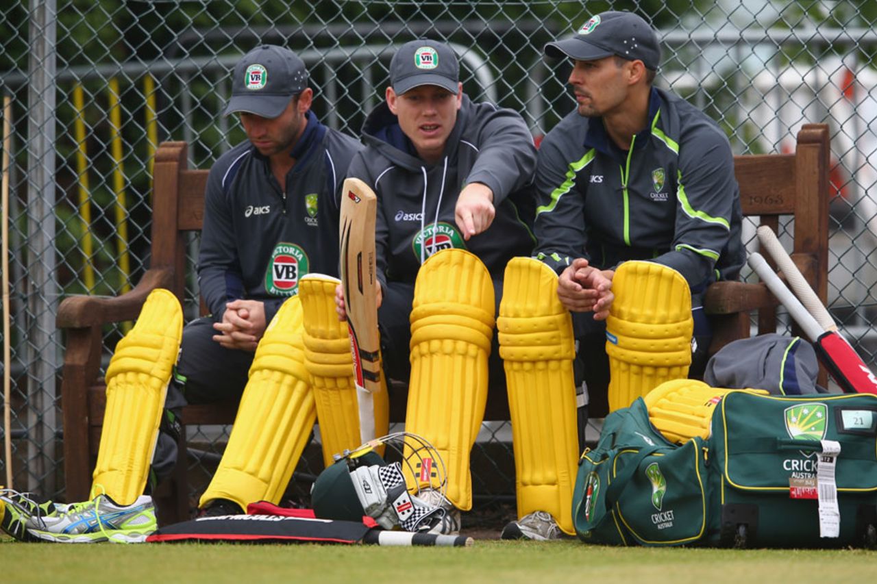 James Faulkner talks tactics with Mitchell Johnson and Phil Hughes at a practice session before their match against New Zealand, Edgbaston, June 11, 2013