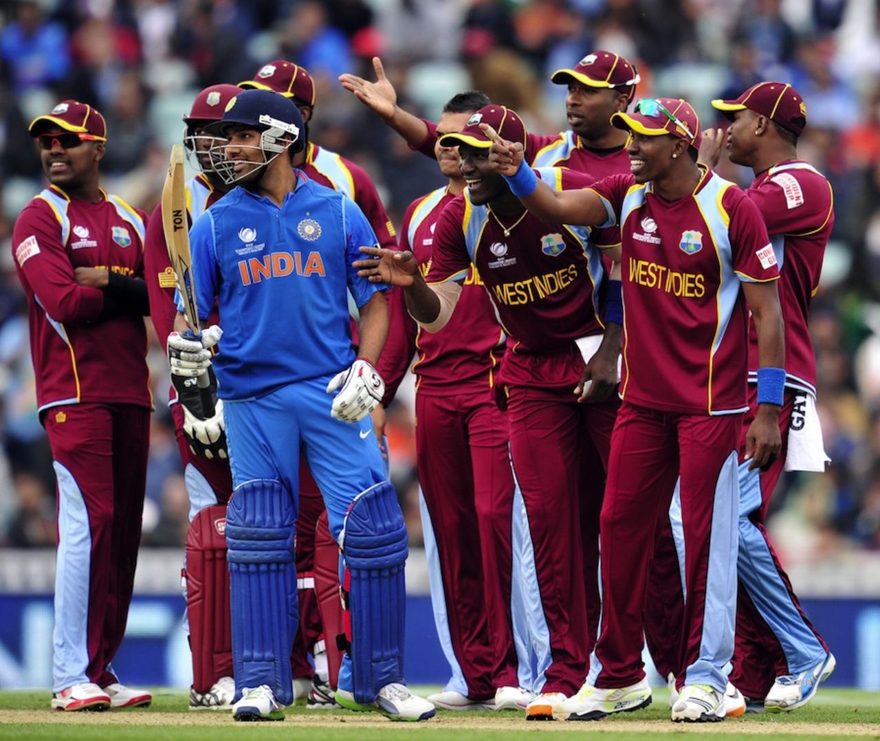 West Indies players joke with Rohit Sharma while waiting for the third umpire's decision, India v West Indies, Champions Trophy, Group B, The Oval, June 11, 2013