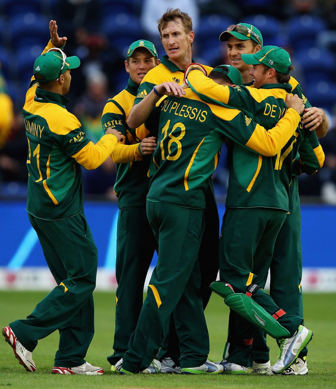 Chris Morris is smothered by team-mates after picking up a wicket, South Africa v West Indies, Champions Trophy, Group B, Cardiff, June 14, 2013