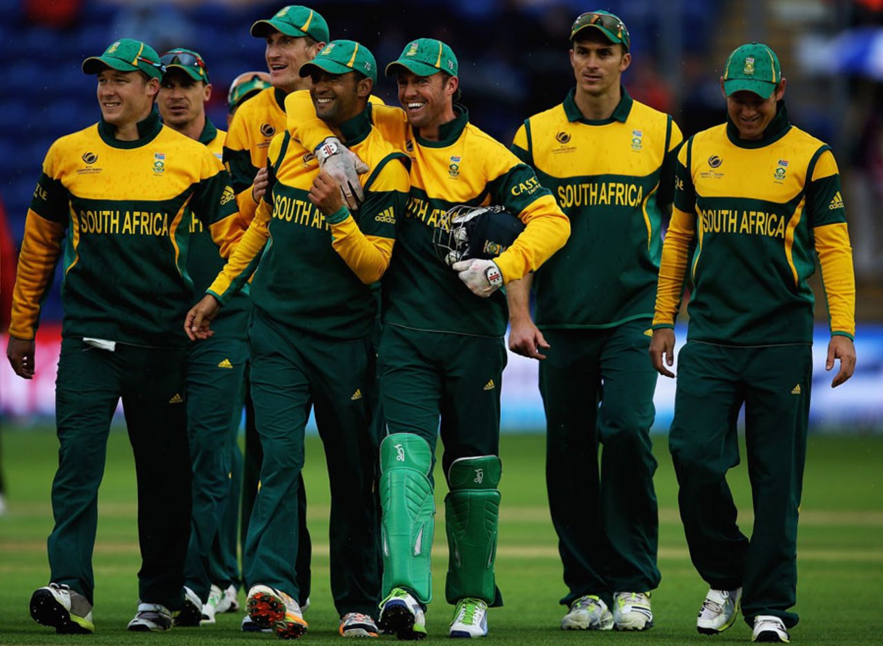 Robin Peterson enjoys a wicket with his team-mates, South Africa v West Indies, Champions Trophy, Group B, Cardiff, June 14, 2013
