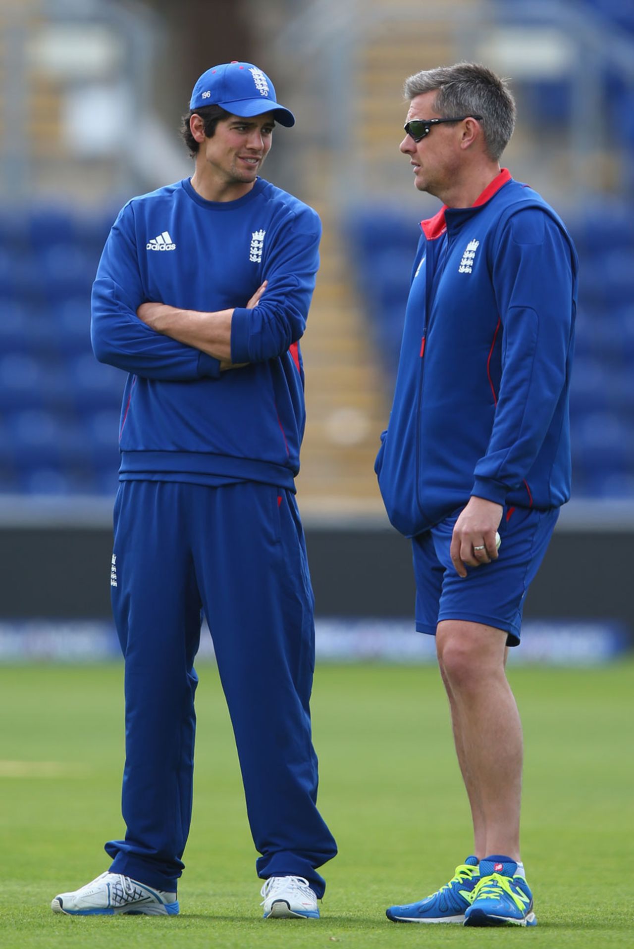 Alastair Cook and Ashley Giles chat during England training, Champions Trophy, Cardiff, June 15, 2013