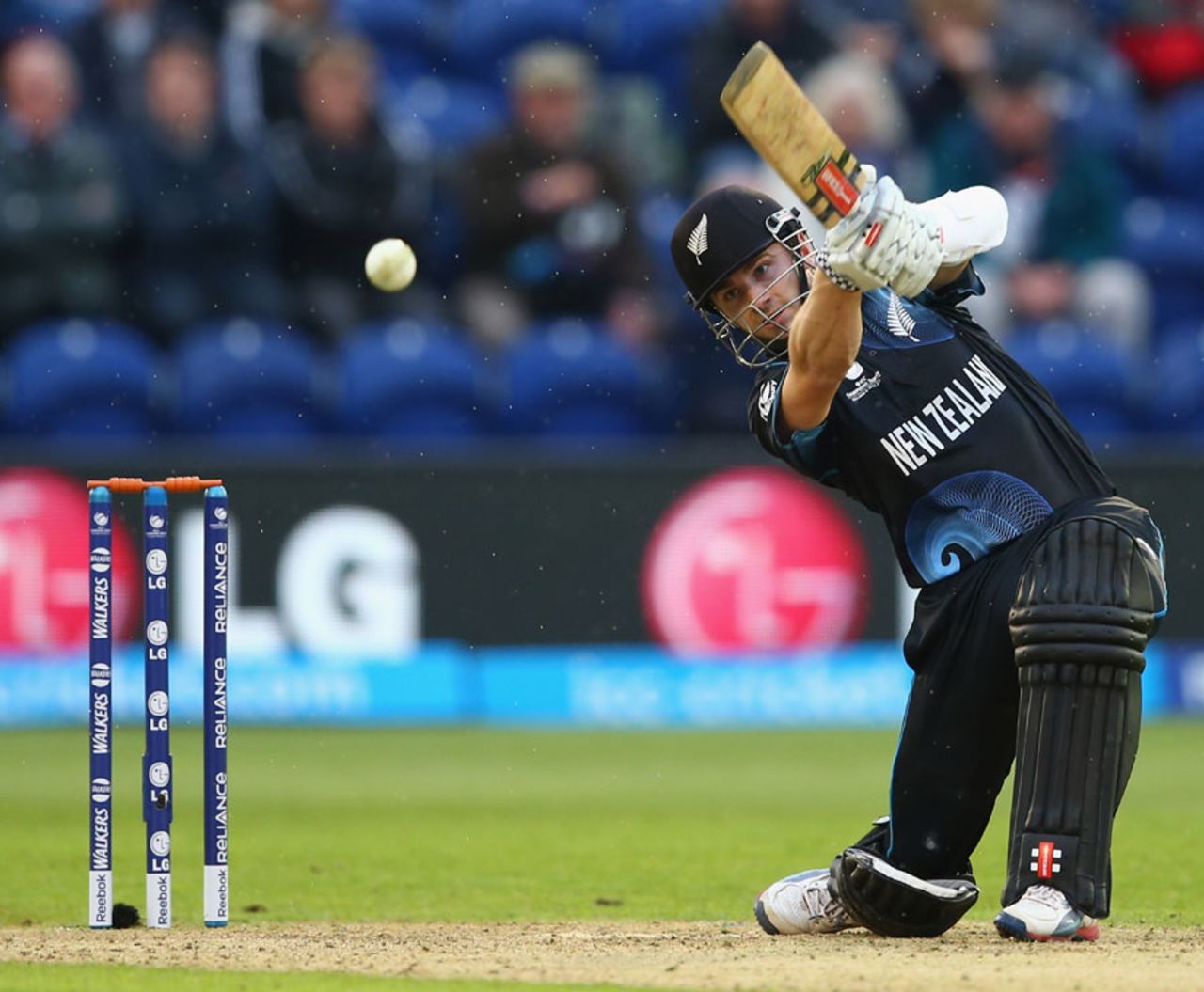 Kane Williamson lofts over cover, England v New Zealand, Champions Trophy, Group A, Cardiff, June 16, 2013
