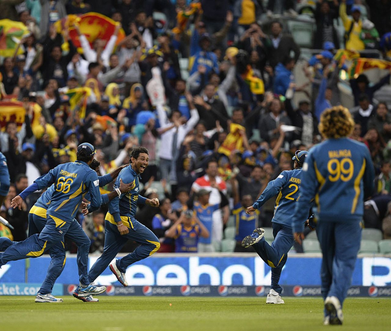 Tillakaratne Dilshan gets chased by his team-mates, Australia v Sri Lanka, Champions Trophy, Group A, The Oval, June 17, 2013