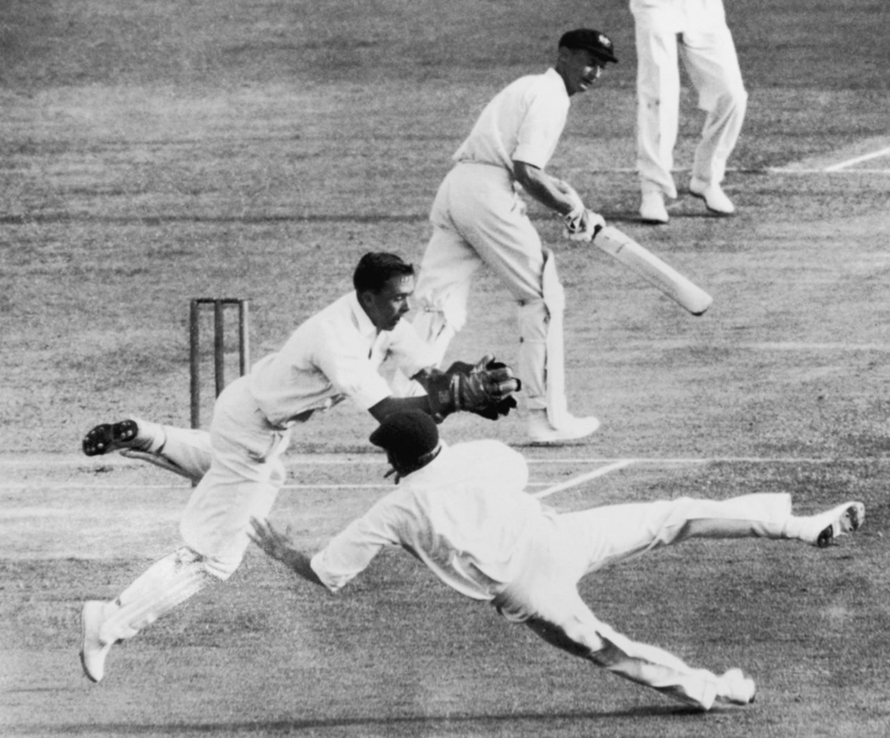 Denis Lindsay dives to catch Brian Booth for 58 off the bowling of Trevor Goddard, Australia v South Africa, 4th Test, Adelaide, 1st day, January 24, 1964