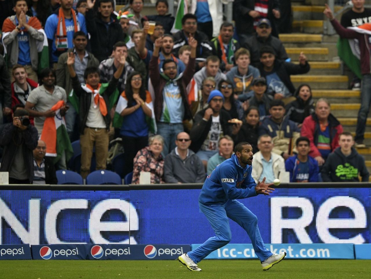 Shikhar Dhawan takes a catch, India v Sri Lanka, Champions Trophy, 2nd semi-final, Cardiff, June 20, 2013