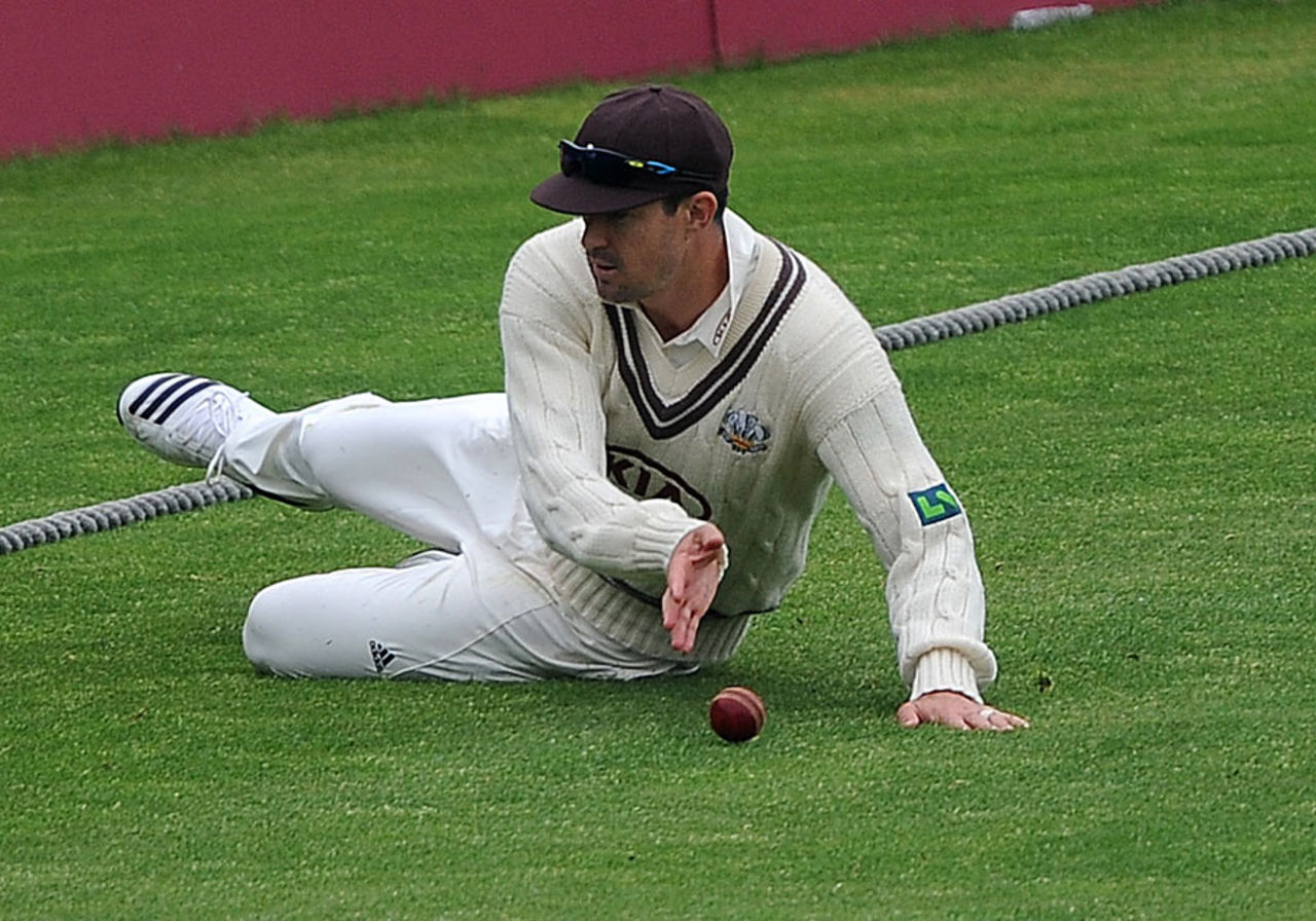 How's that knee? Kevin Pietersen slides on the boundary, Yorkshire v Surrey, County Championship, Division One, Headingley, 1st day, June 21, 2013