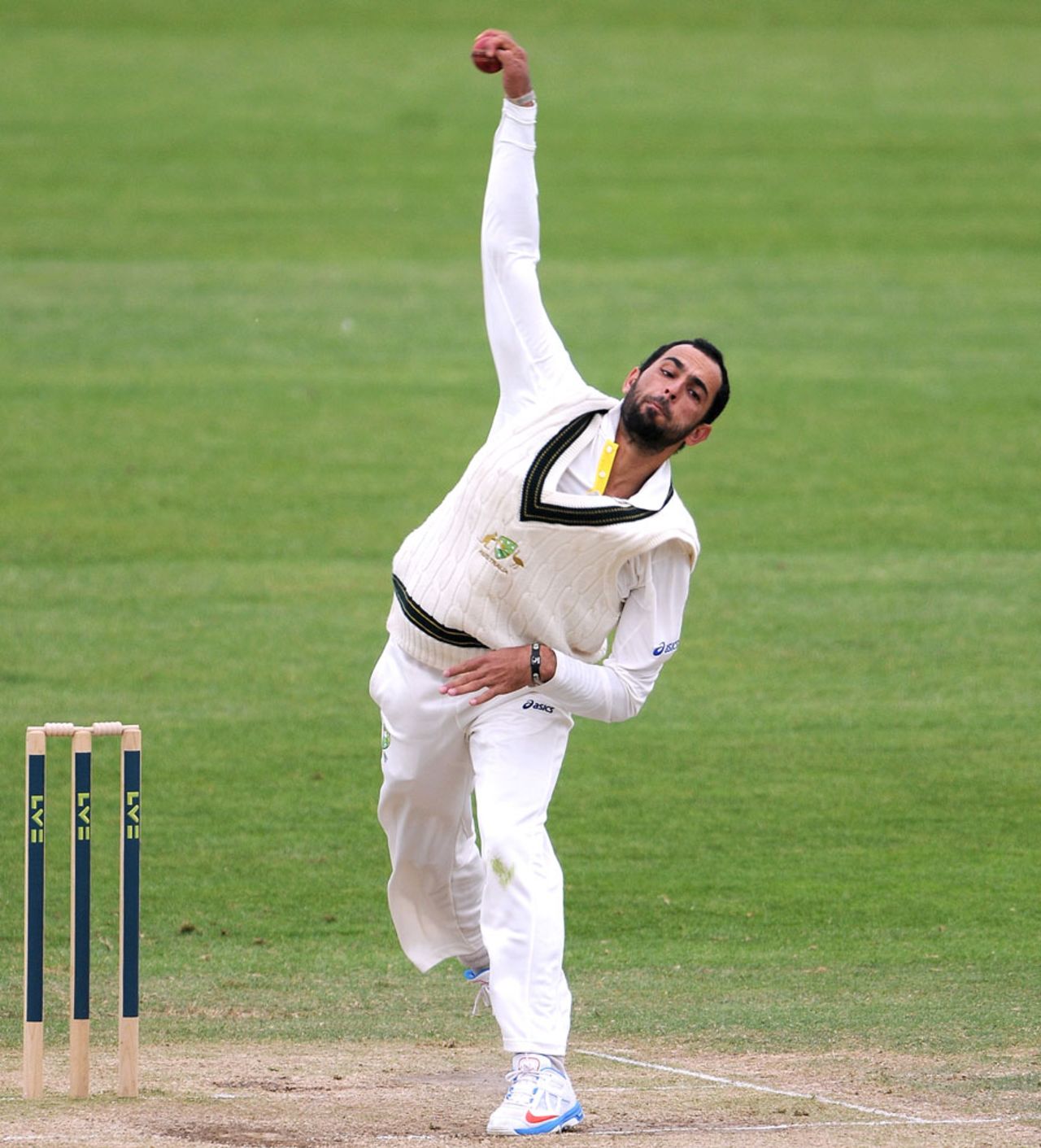 Fawad Ahmed in his delivery stride, Gloucestershire v Australia A, Tour match, Bristol, 2nd day, June 22, 2013