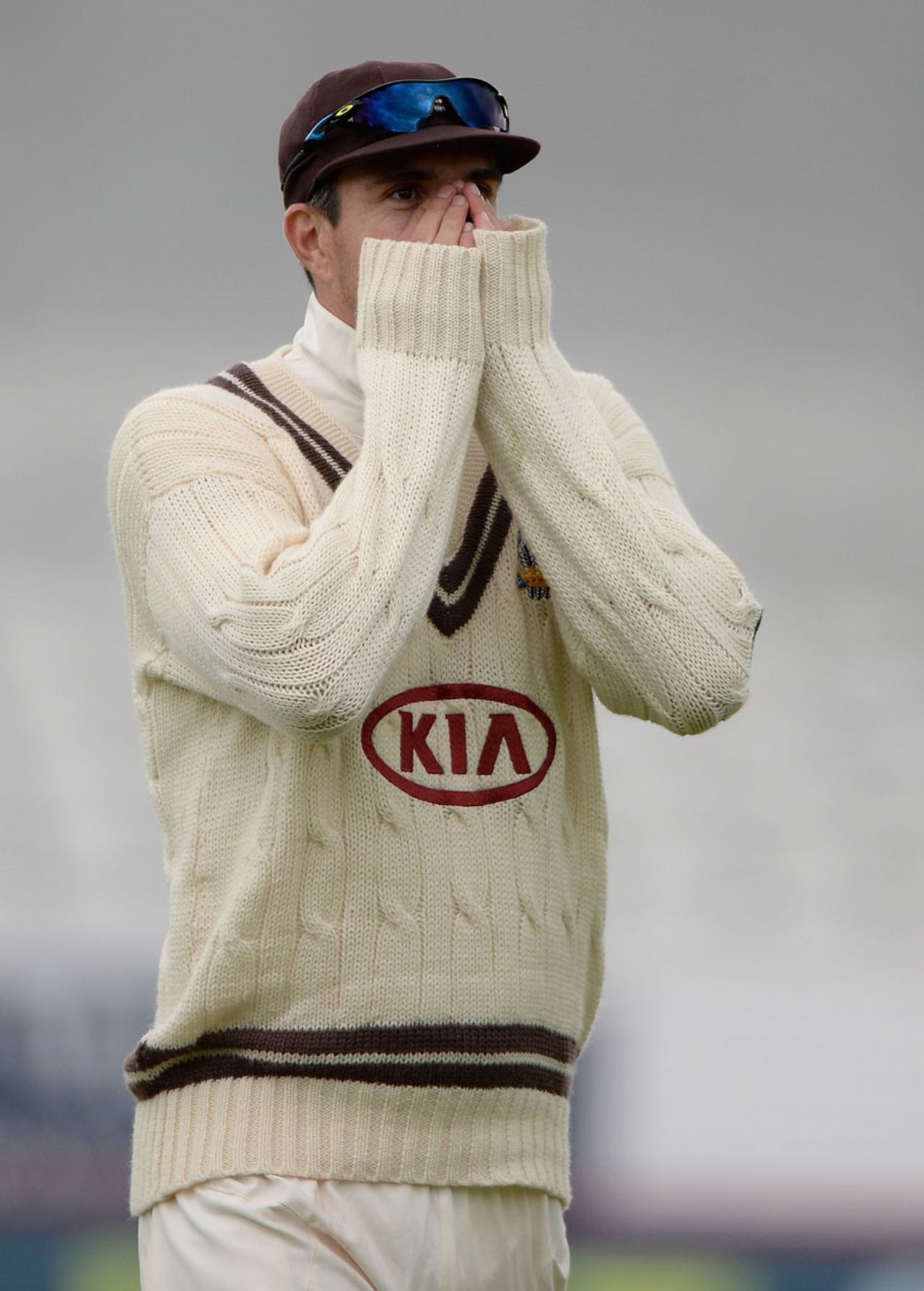 Kevin Pietersen does his best to keep warm, Yorkshire v Surrey, County Championship, Division One, Headingley, 2nd day, June, 22, 2013