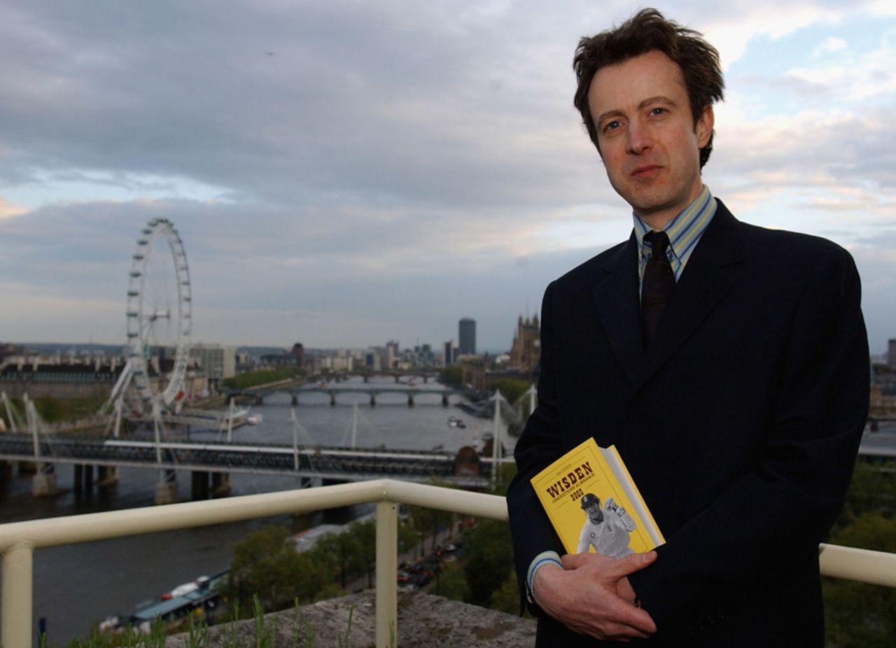 Editor Tim de Lisle with a copy of the 2003 <i>Wisden Cricketers' Almanack</i>