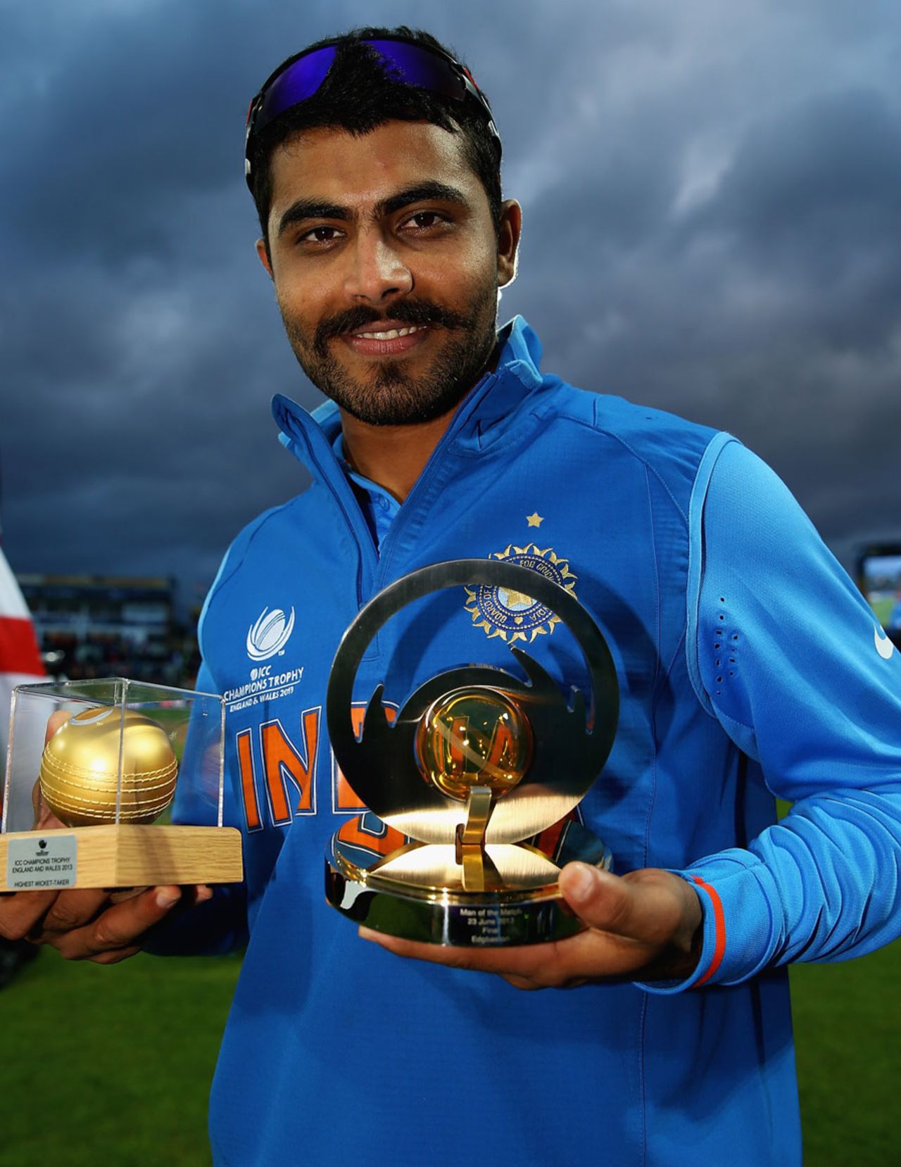 Ravindra Jadeja poses with the Man of the Match and golden ball awards England v India, Champions Trophy final, Edgbaston, June 23, 2013