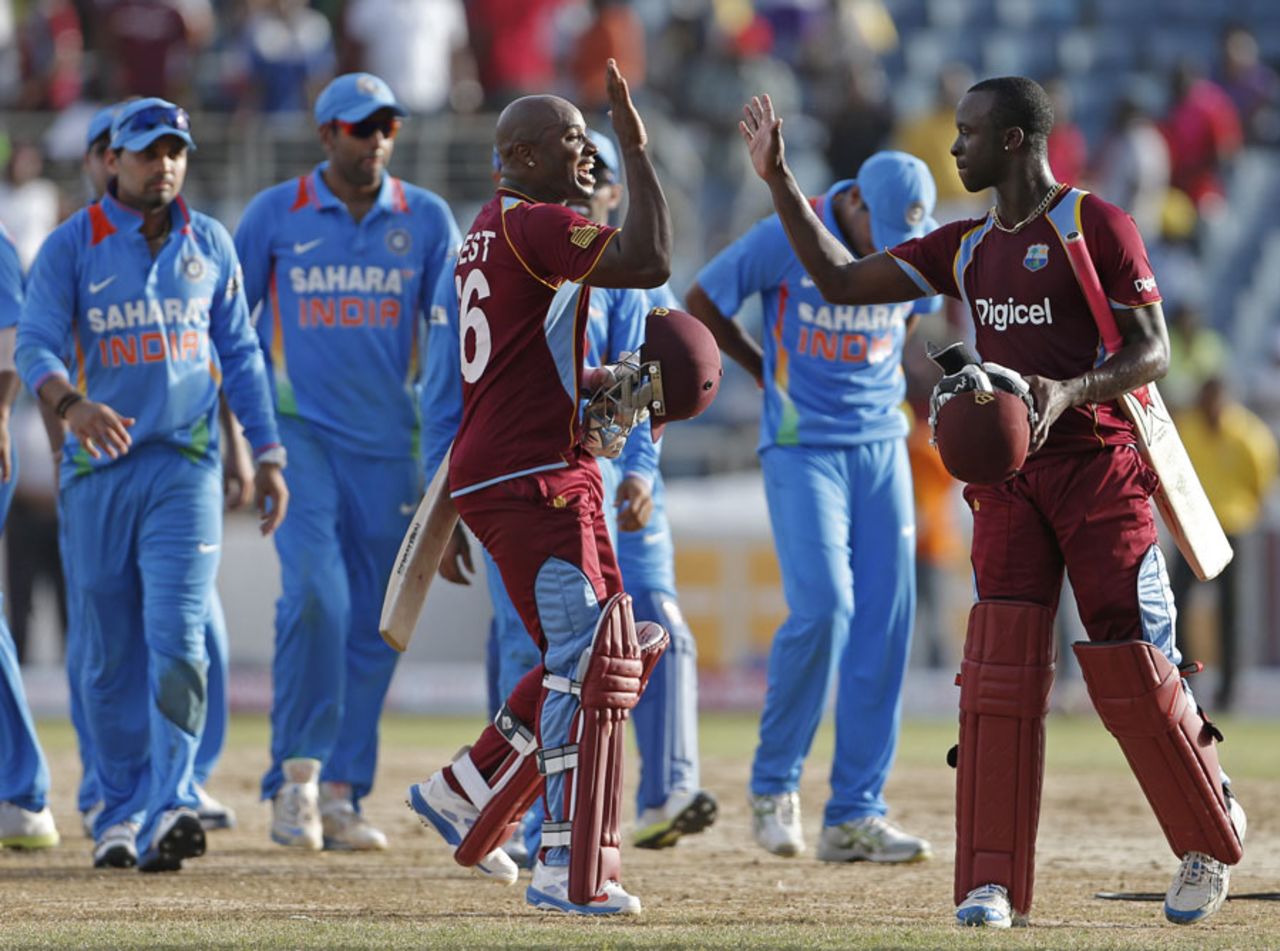 Tino Best and Kemar Roach celebrate West Indies' victory, West Indies v India, tri-series, Kingston, June 30, 2013