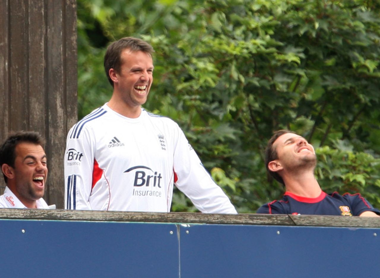 Graeme Swann enjoys a lighter moment on the players' balcony, Essex v England, 2nd day, Chelmsford, July 1, 2013