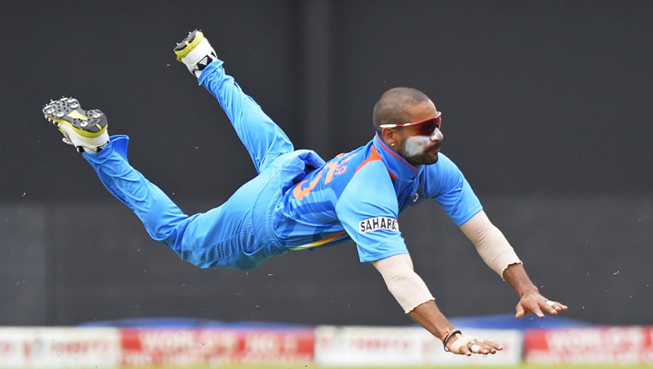 Shikhar Dhawan dives in the field , India v Sri Lanka, West Indies tri-series, Kingston, July 2, 2013