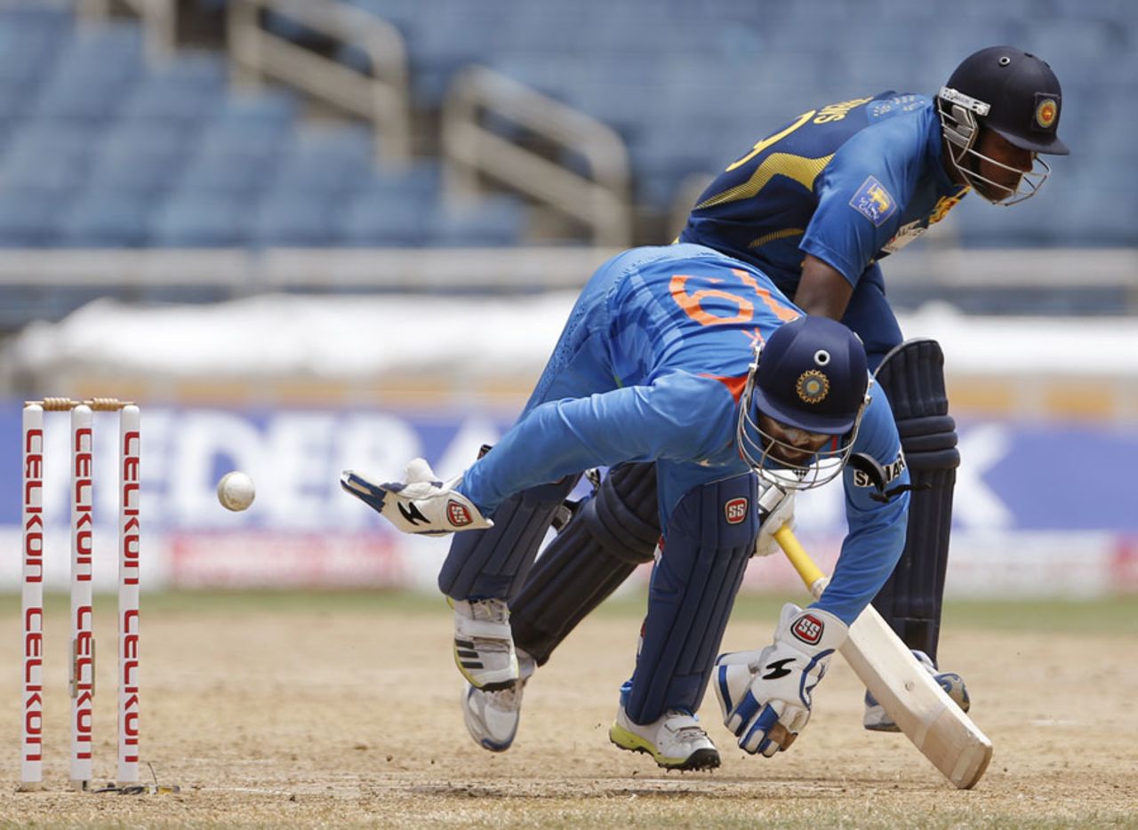 Dinesh Karthik attempts to run out Angelo Mathews, India v Sri Lanka, West Indies tri-series, Kingston, July 2, 2013