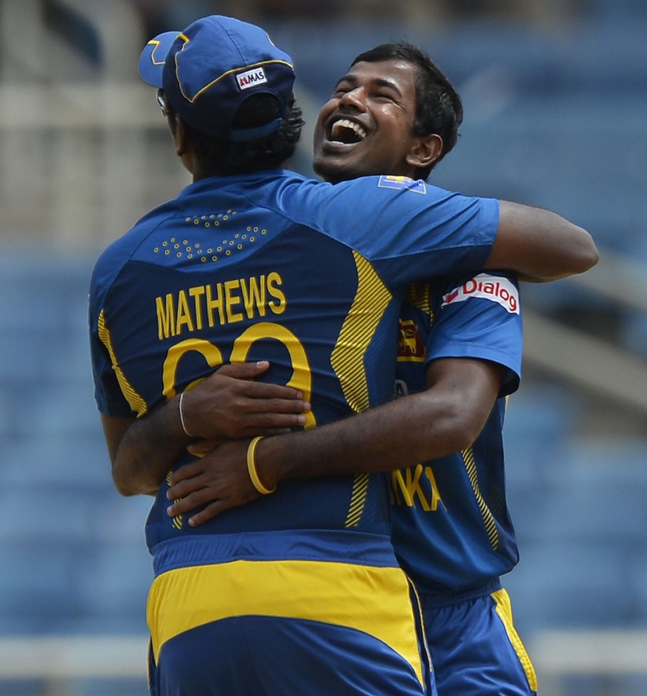 Nuwan Kulasekara is embraced by Angelo Mathews after he picked up the first wicket, India v Sri Lanka, West Indies tri-series, Kingston, July 2, 2013