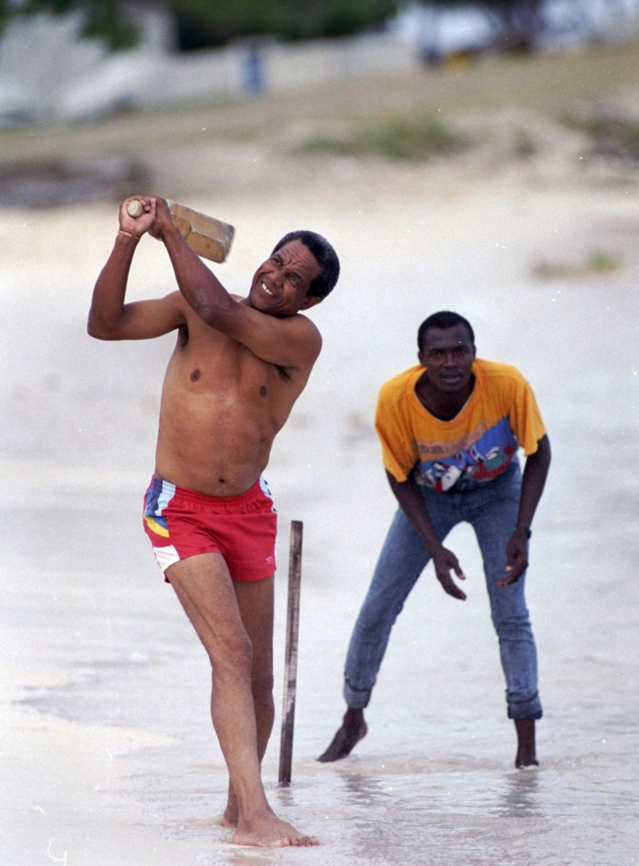 Garry Sobers plays beach cricket in Barbados, April 1, 1990