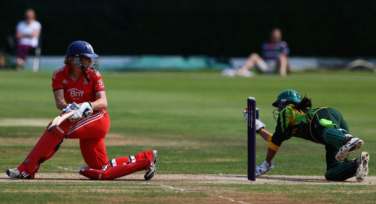 Susie Rowe looks on as Pakistan keeper Batool Fatima takes a catch, England v Pakistan, 1st women's T20, Loughborough, July 5, 2013