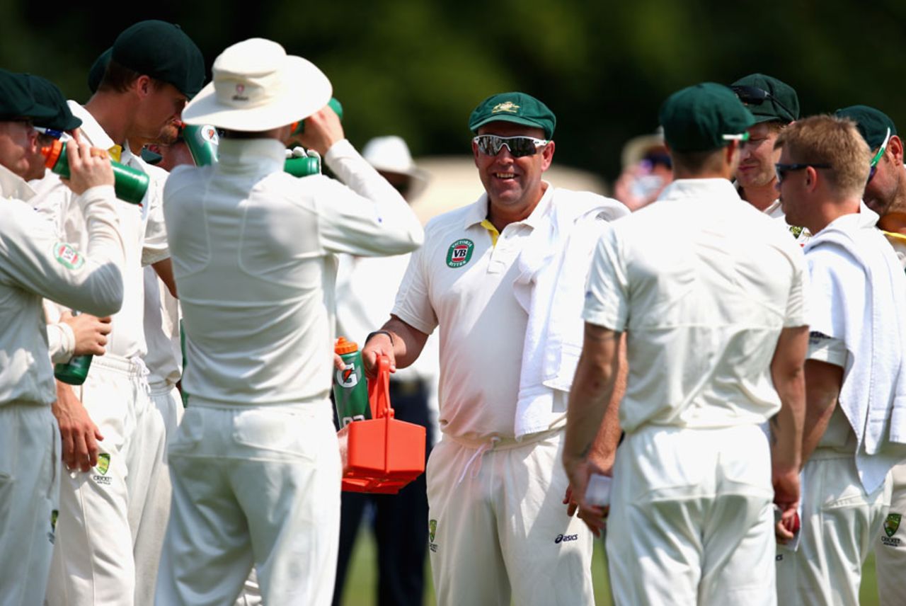 Darren Lehmann carries drinks during the tour game at New Road, Worcestershire v Australians, 4th day, July 5, 2013