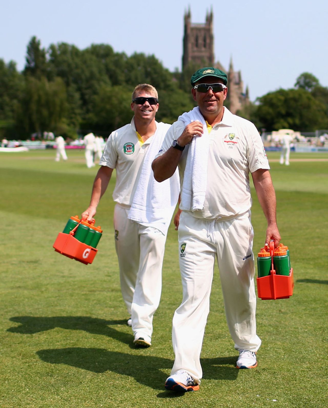 Darren Lehmann and David Warner walk off after carrying drinks, Worcestershire v Australians, 4th day, July 5, 2013