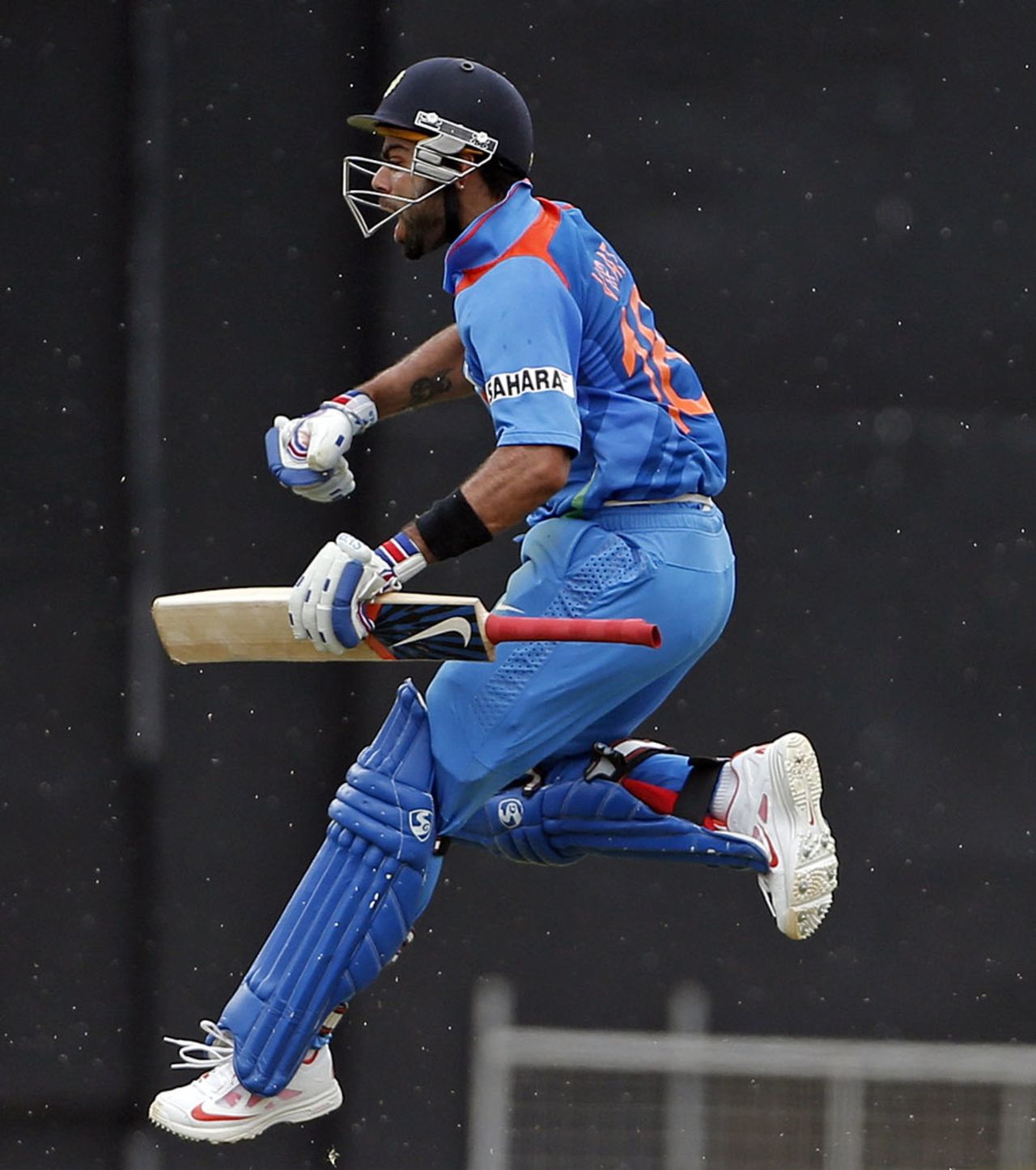 Virat Kohli exults after scoring his 14th ODI hundred, West Indies v India, West Indies tri-series, Port of Spain, July 5, 2013
