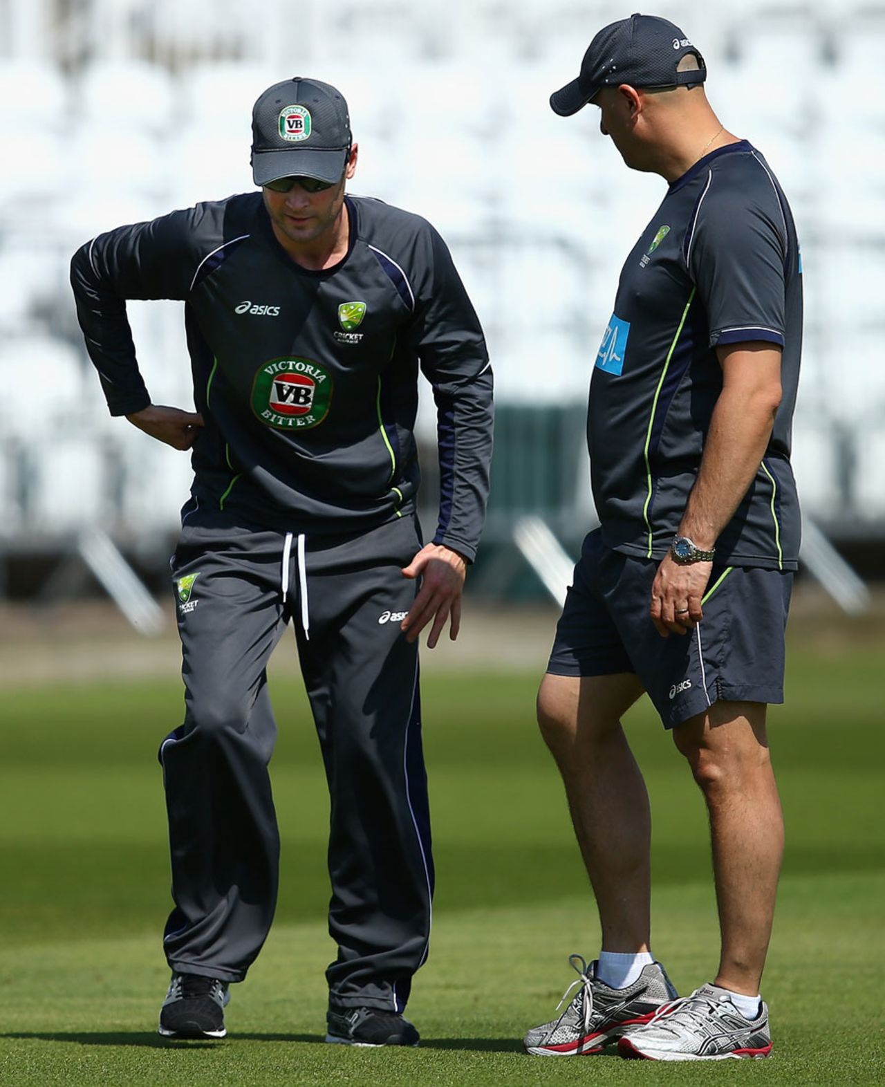 Michael Clarke talks to Australia's physiotherapist, Alex Kontouris, Trent Bridge, July 7, 2013