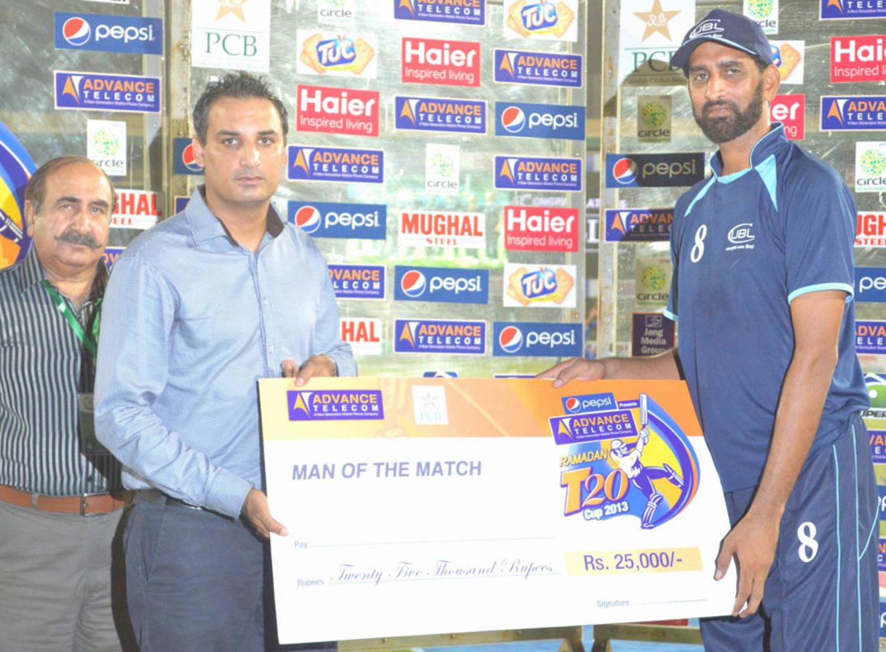 Shabbir Ahmed collects the Man-of-the-Match award, Pakistan International Airlines v United Bank Limited, Ramadan T20 Cup, Karachi, July 7, 2013