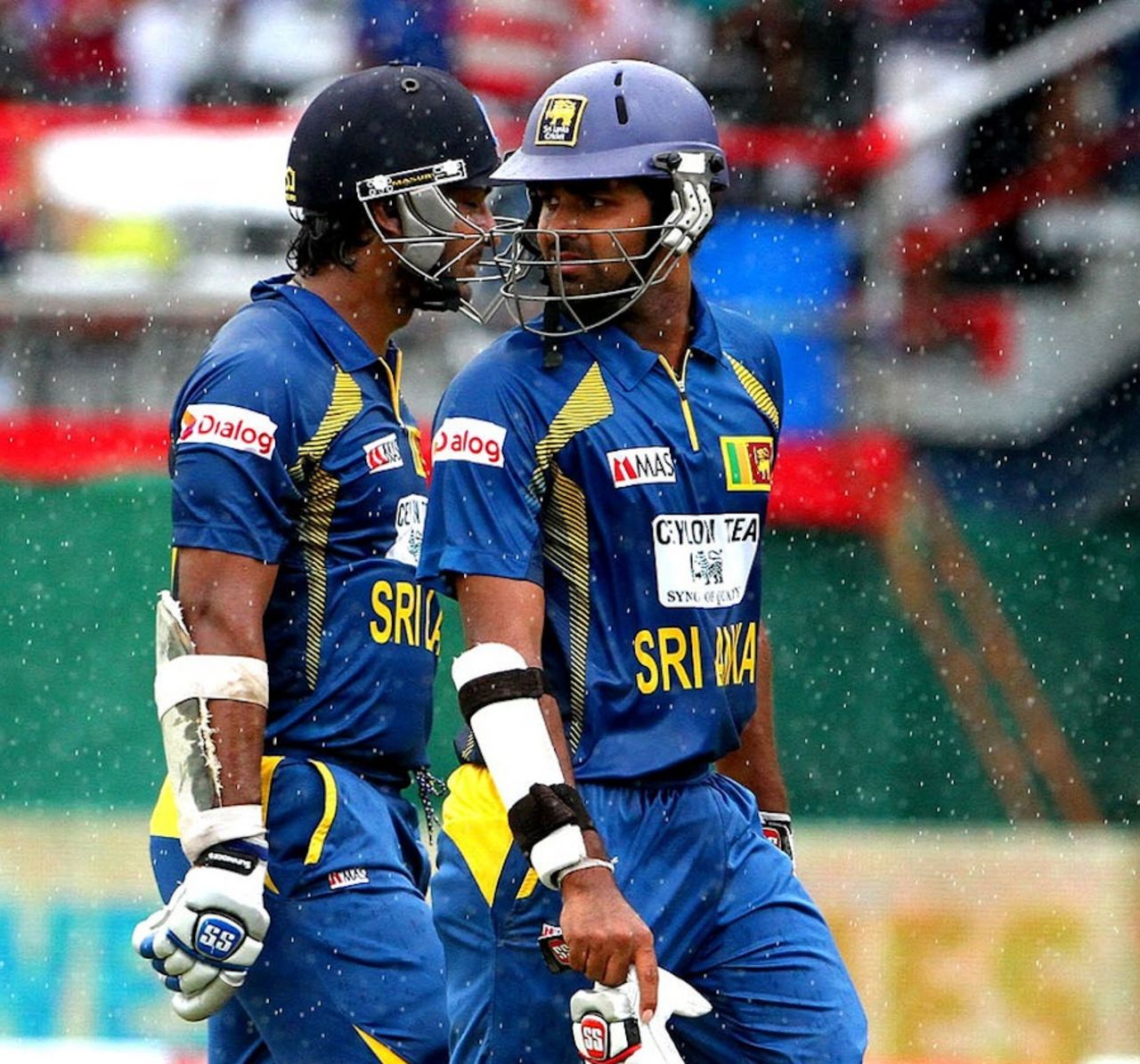 Kumar Sangakkara and Lahiru Thirimanne walk off after a rain interruption, West Indies v Sri Lanka, West Indies tri-series, Port of Spain, July 7, 2013