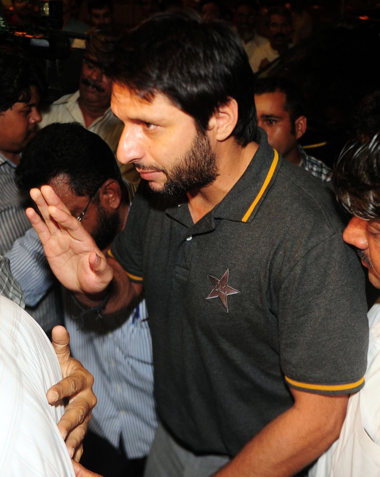 Shahid Afridi arrives at the airport, Karachi, July 7, 2013
