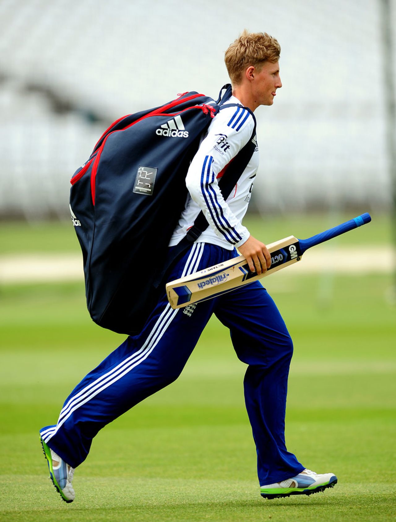 Joe Root jogs with his kit, Trent Bridge, July 8, 2013