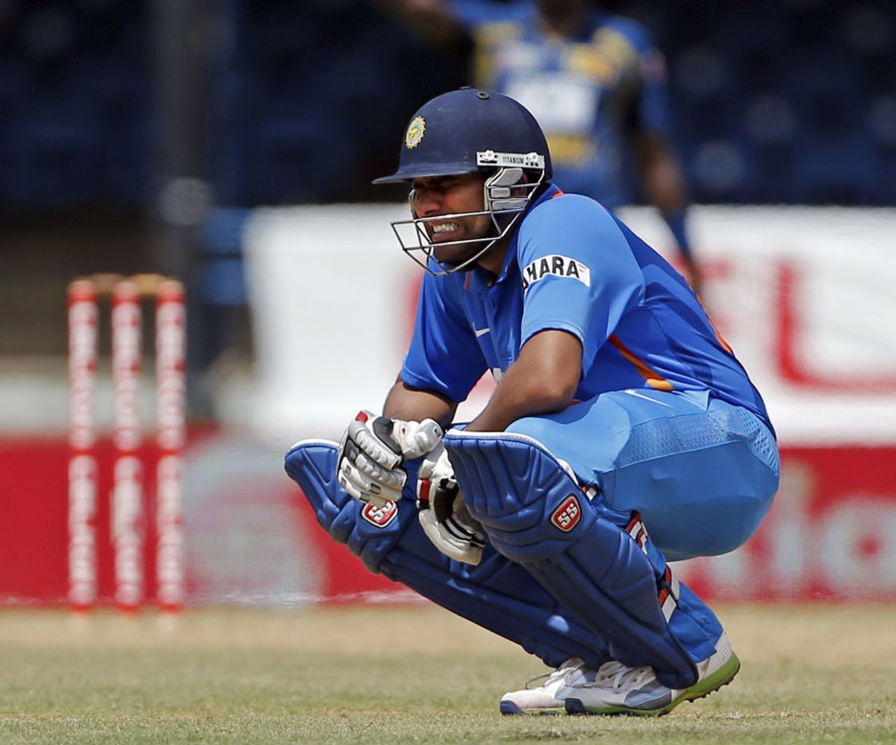 Rohit Sharma grimaces after getting hit on the body, India v Sri Lanka, West Indies tri-series, Port-of-Spain, July 9, 2013