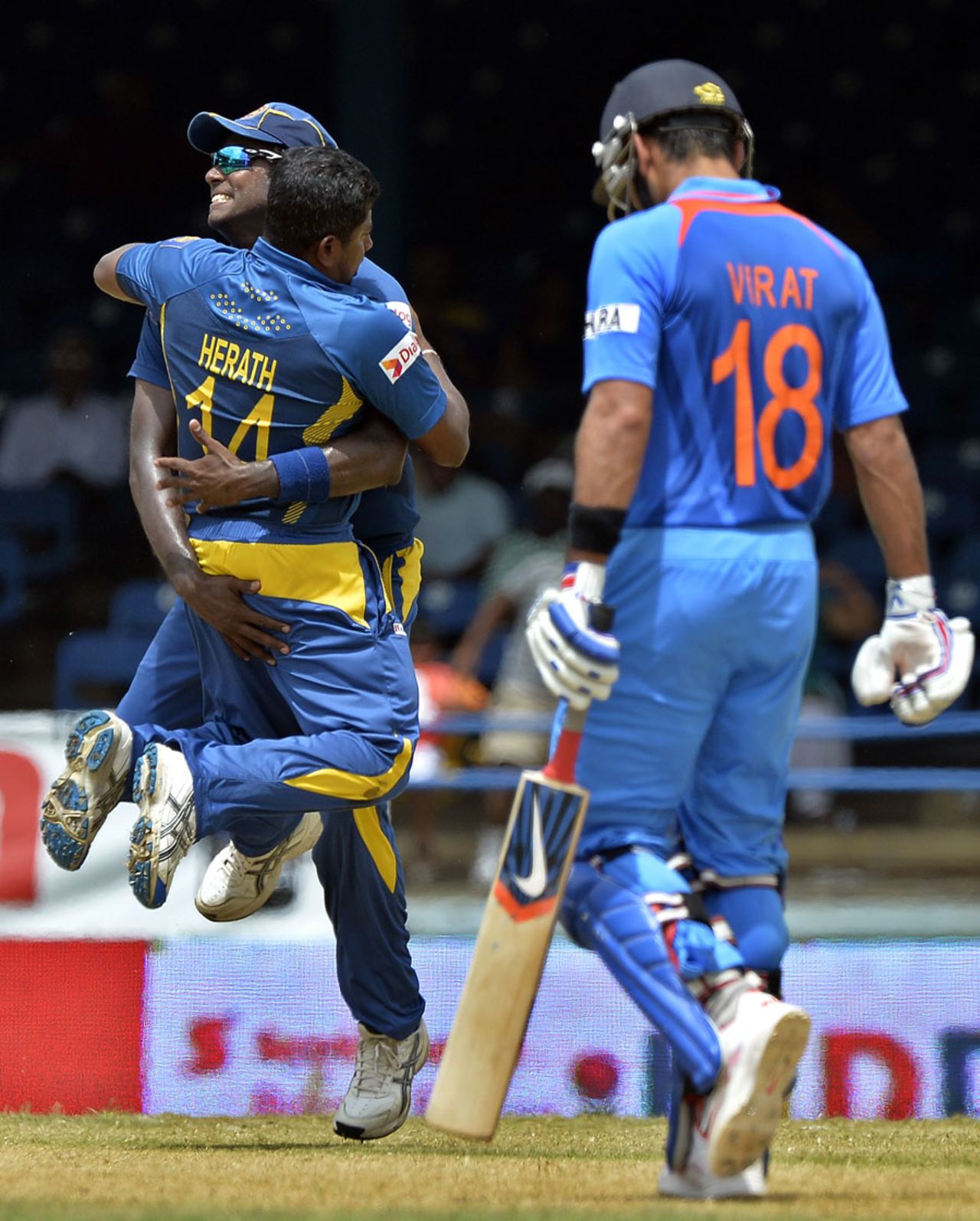 Rangana Herath celebrates the fall of Virat Kohli, India v Sri Lanka, West Indies tri-series, Port-of-Spain, July 9, 2013
