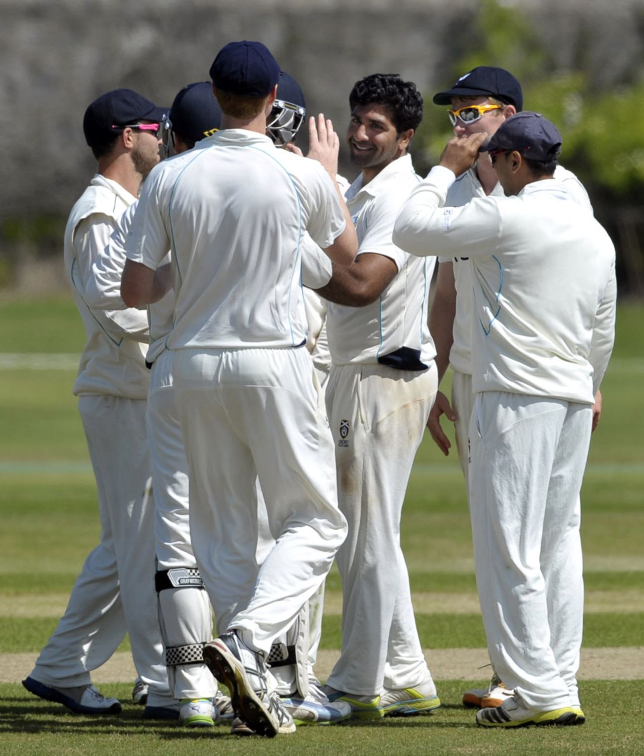 Majid Haq celebrates a wicket with his team-mates , Scotland v Kenya, ICC Intercontinental Cup, 2nd day, Aberdeen, July 8, 2013